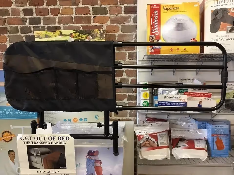 Medical equipment rack and transfer devices in a brick-walled interior at Byrne Home Health Center.