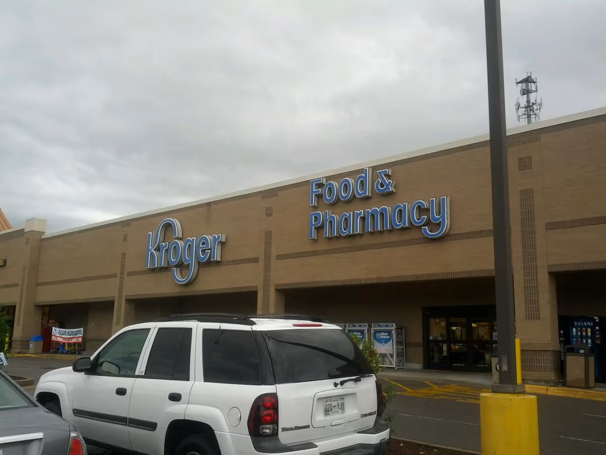 Exterior view of a Kroger store with a blue Food and Pharmacy sign.