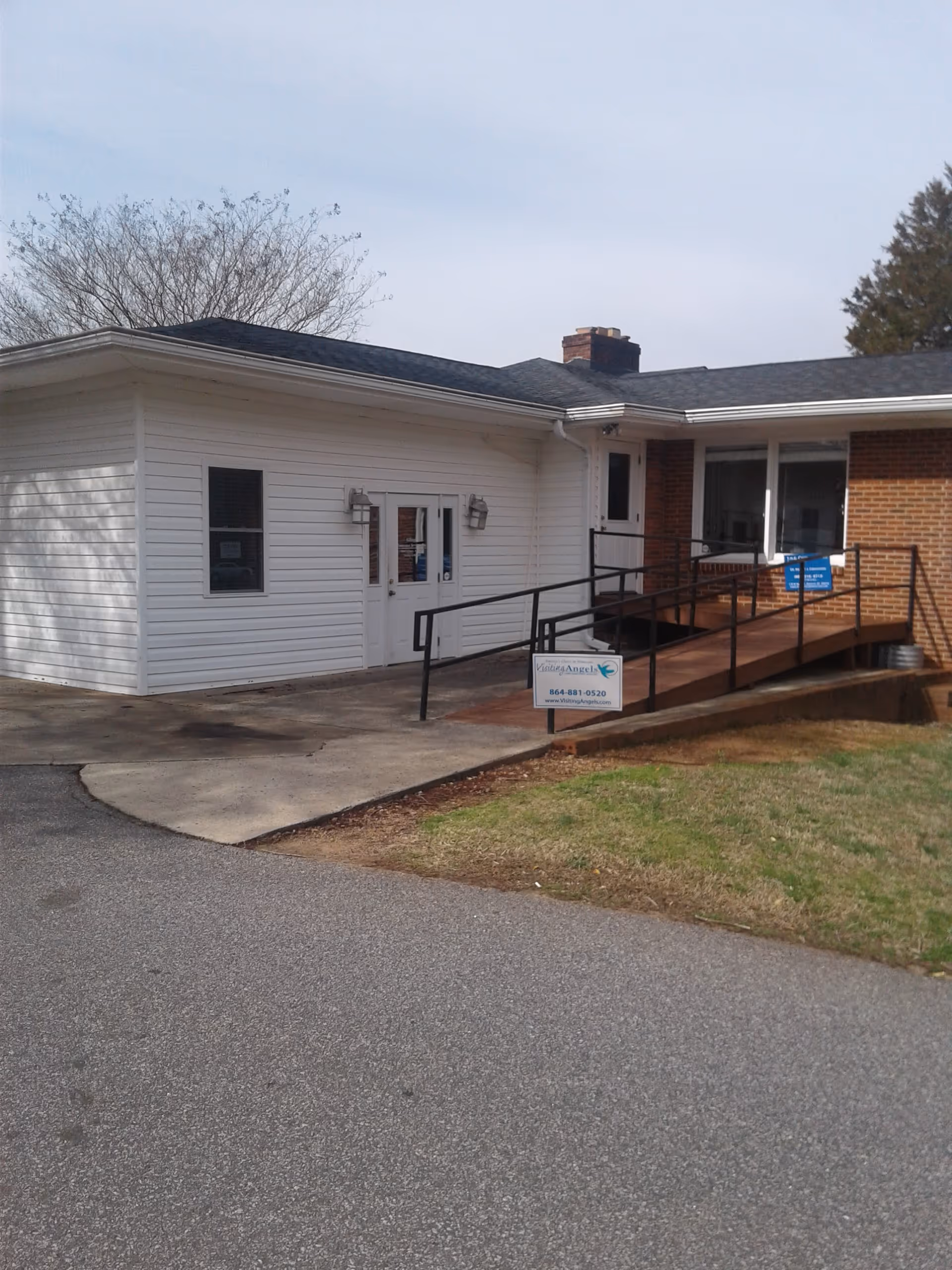 Exterior view of Visiting Angels Senior Home Care entrance with ramp