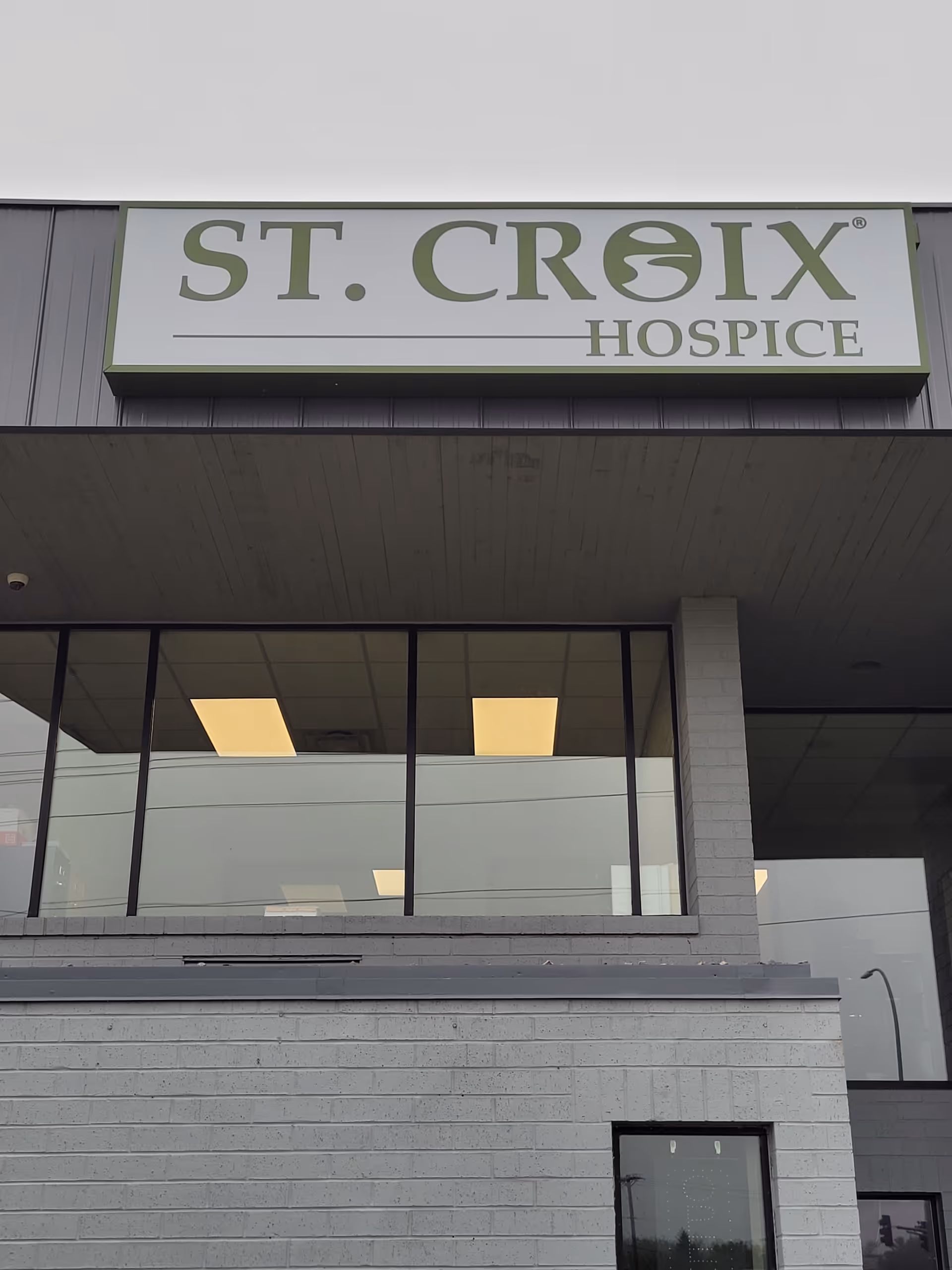 Exterior view of a building with a St. Croix Hospice sign.