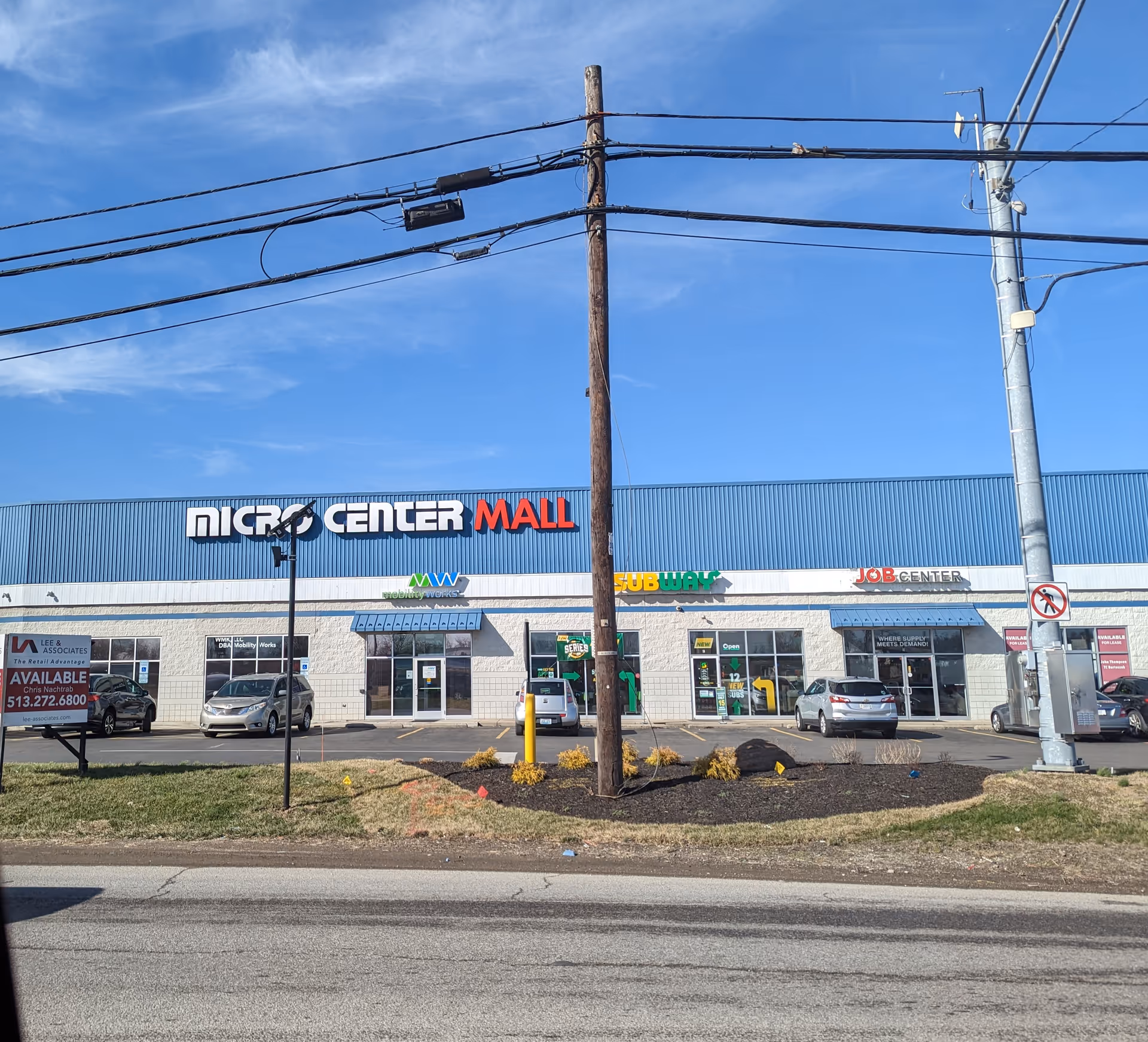 Front of a shopping plaza showing Micro Center Mall and Subway storefronts.