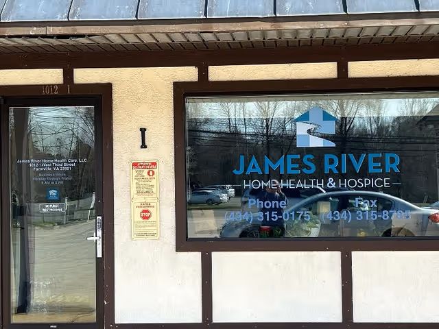 Exterior of James River Home Health & Hospice building with large blue sign in window.