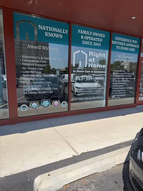 Storefront window advertising Right at Home in-home care services.