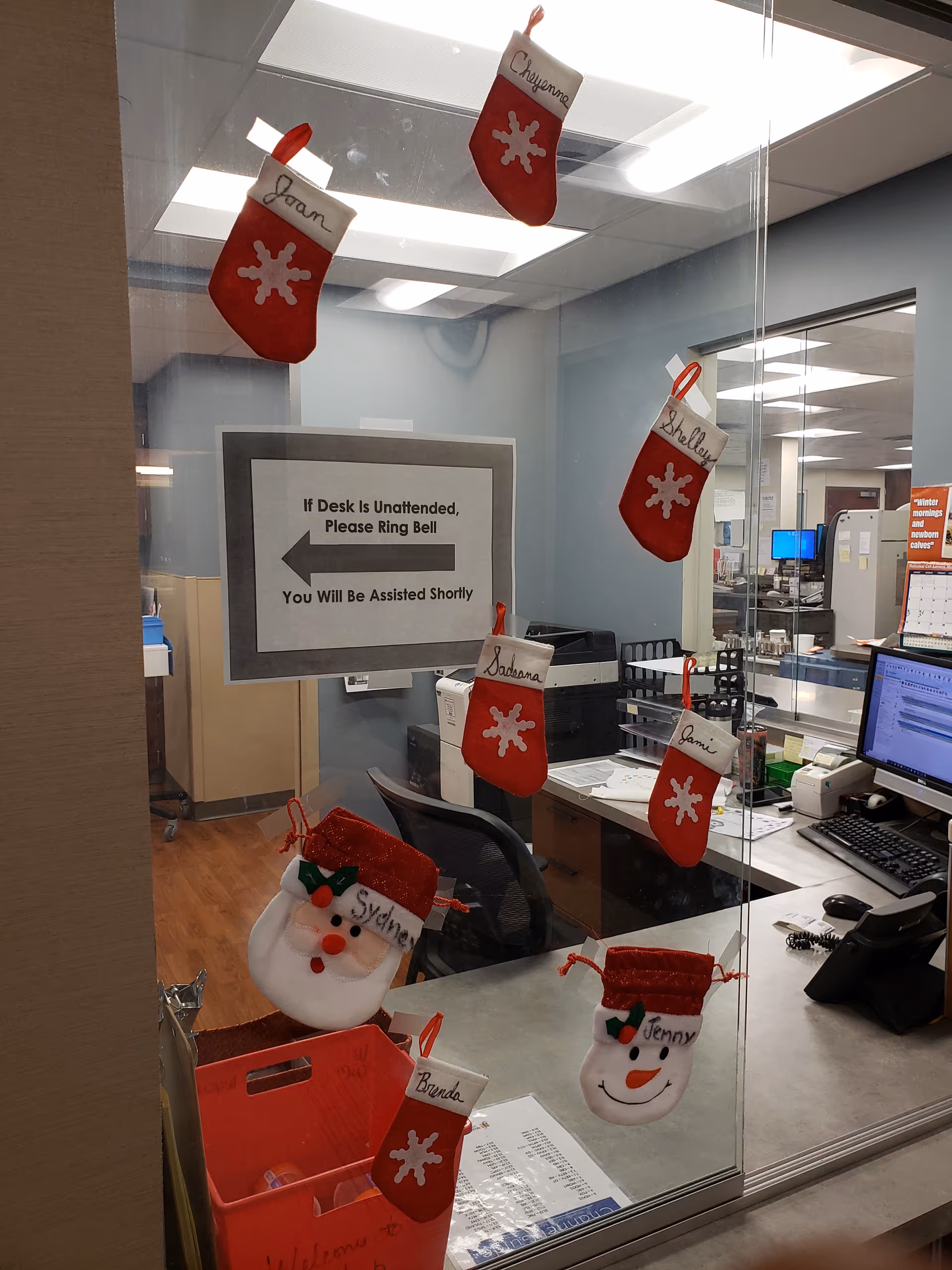 Shenandoah Medical Center reception area with stockings, snowmen, and a computer desk.