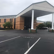 Exterior view of SSM Health at Home entrance with a covered drop-off area.