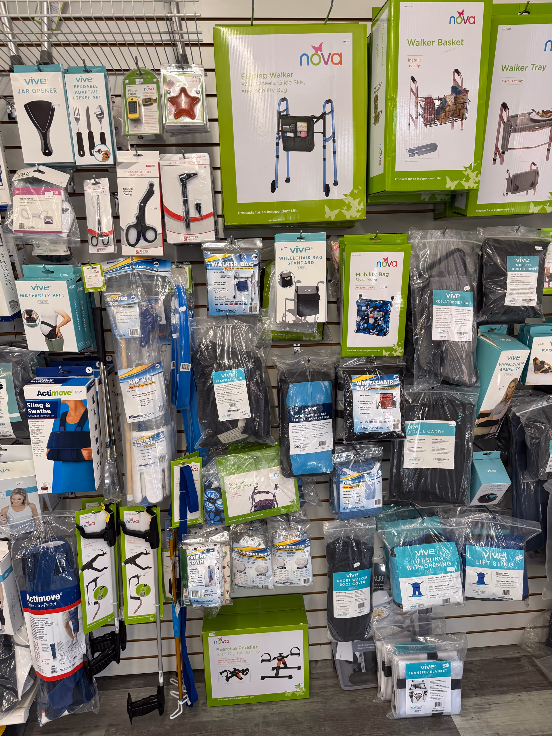 Indoor store wall displaying boxed senior care and mobility accessories on racks.