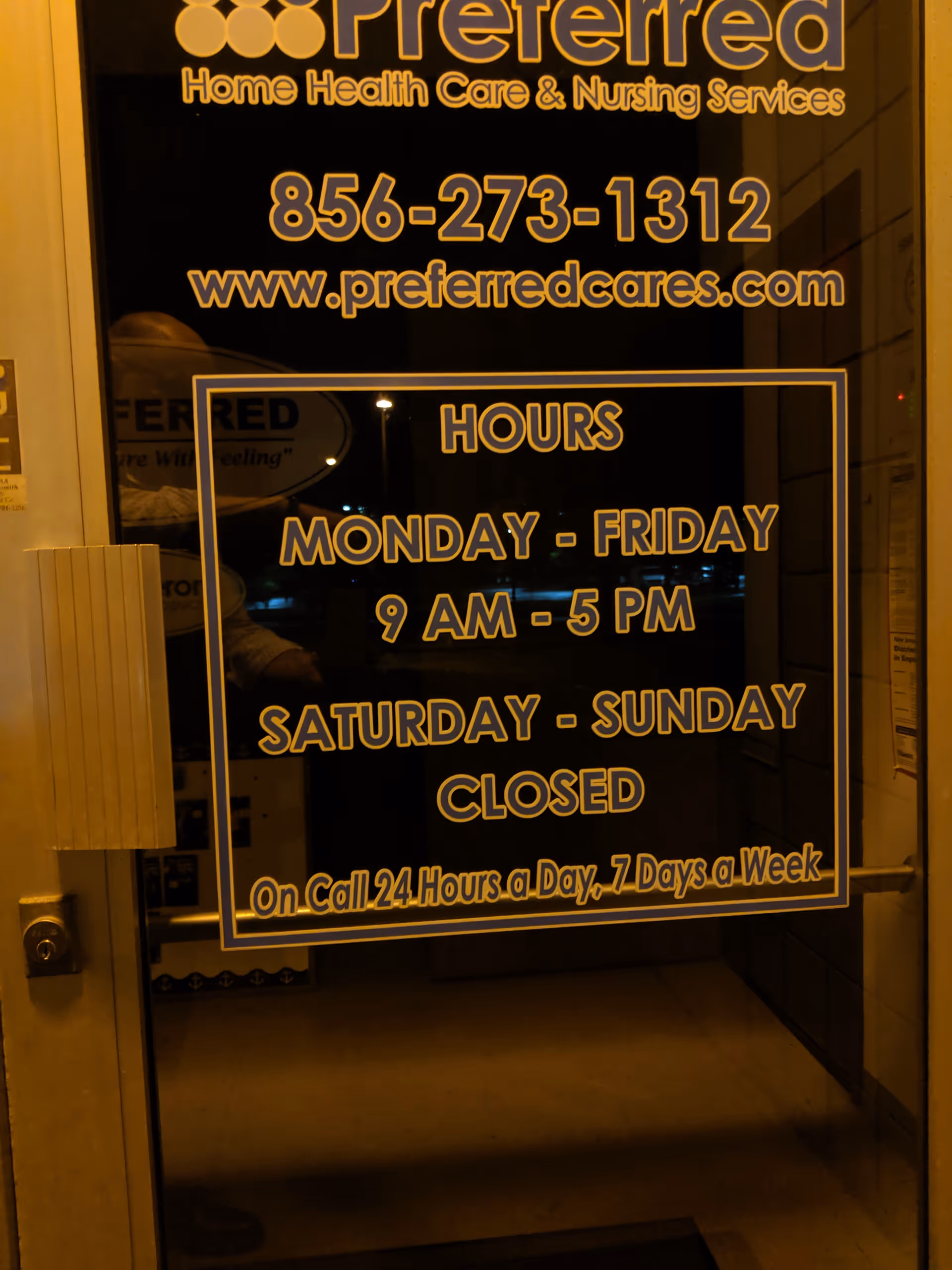 Glass door displays hours and contact information for a home health care facility.