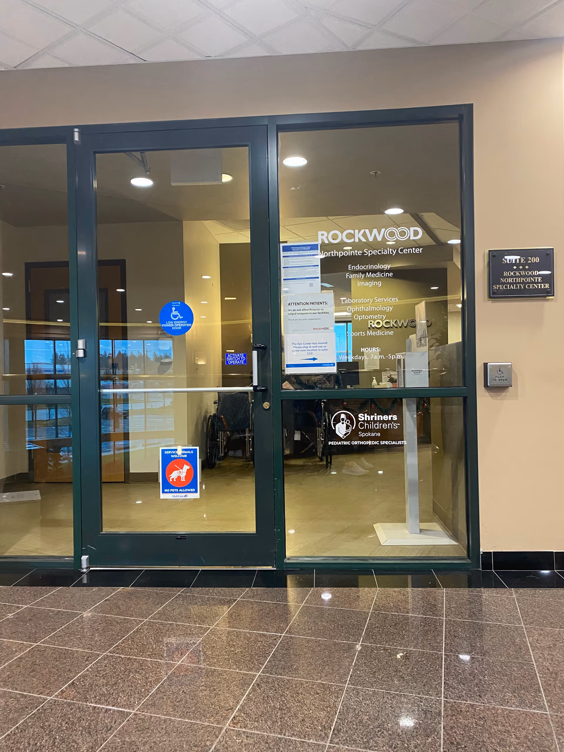 Glass entrance doors of Rockwood Northpointe Specialty Center with lobby signage visible.