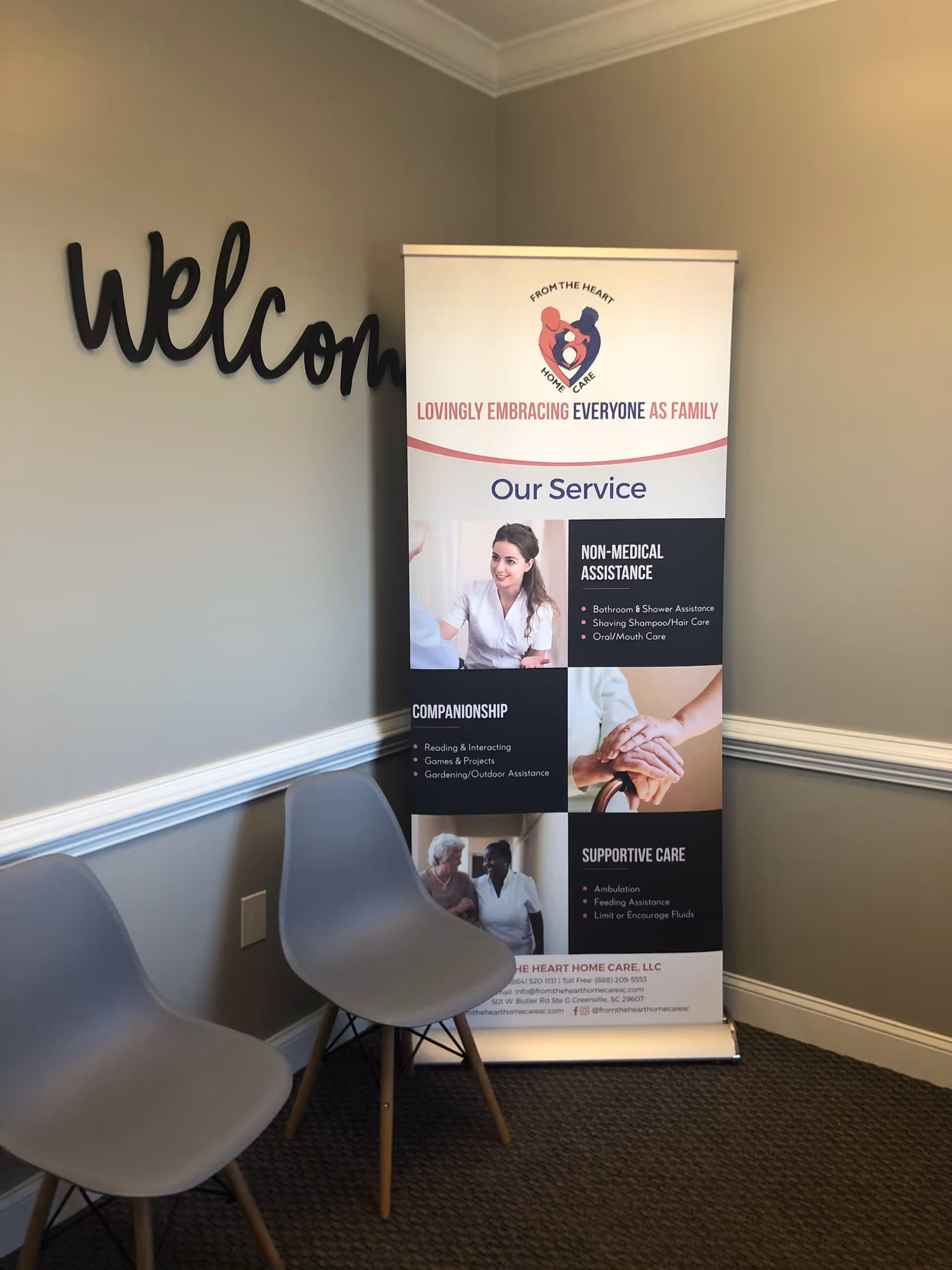Lobby corner with a welcome sign and From the Heart Home Care banner.