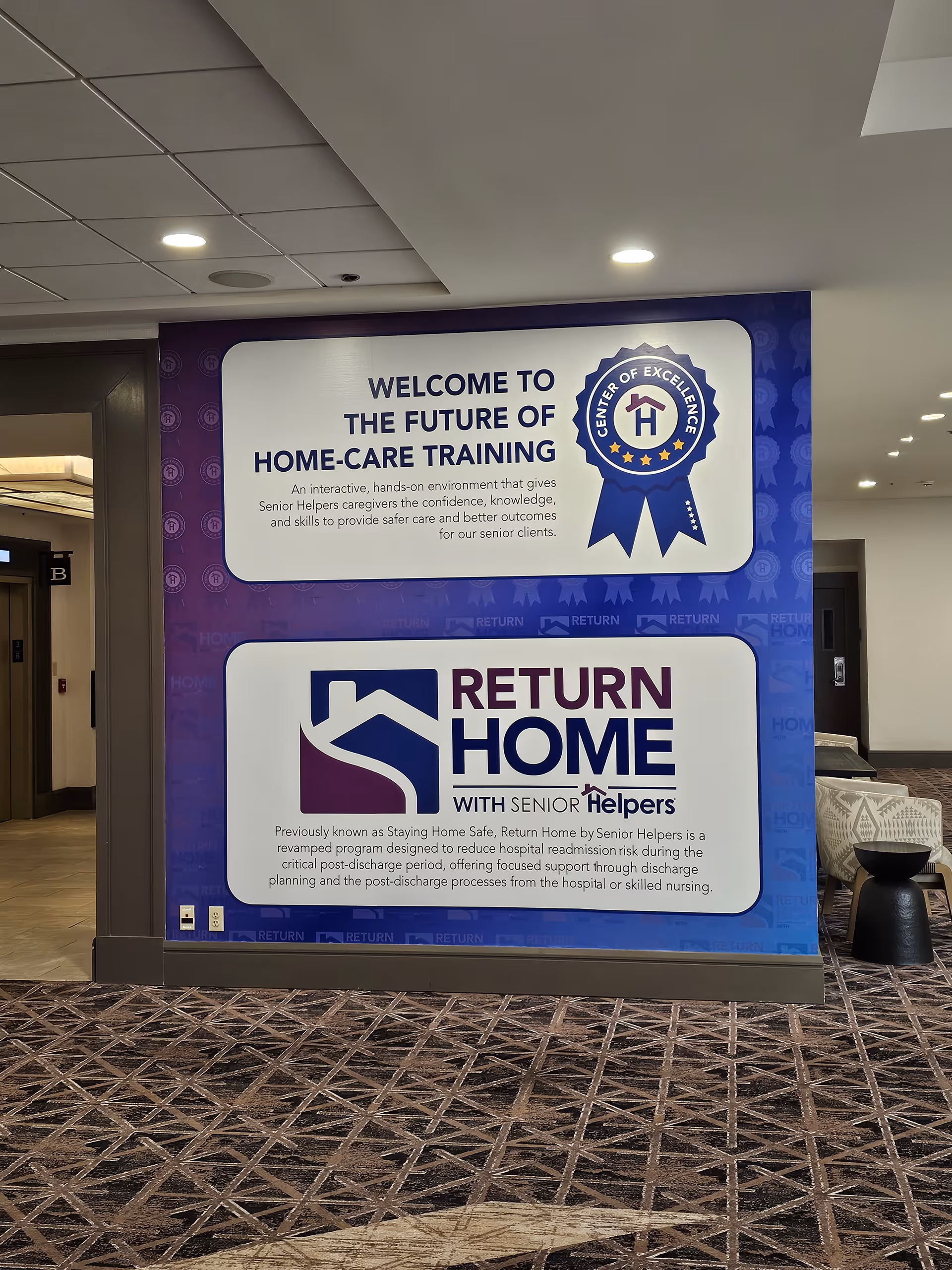 Indoor lobby with large banners reading Welcome to the Future of Home-Care Training.