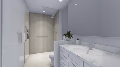 Modern shared bathroom with double sinks, marble countertop, and a glass enclosed shower.