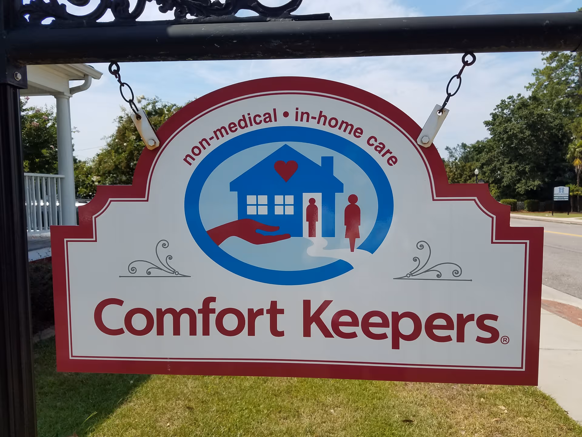 Outdoor sign for Comfort Keepers Home Care with logo and house icon