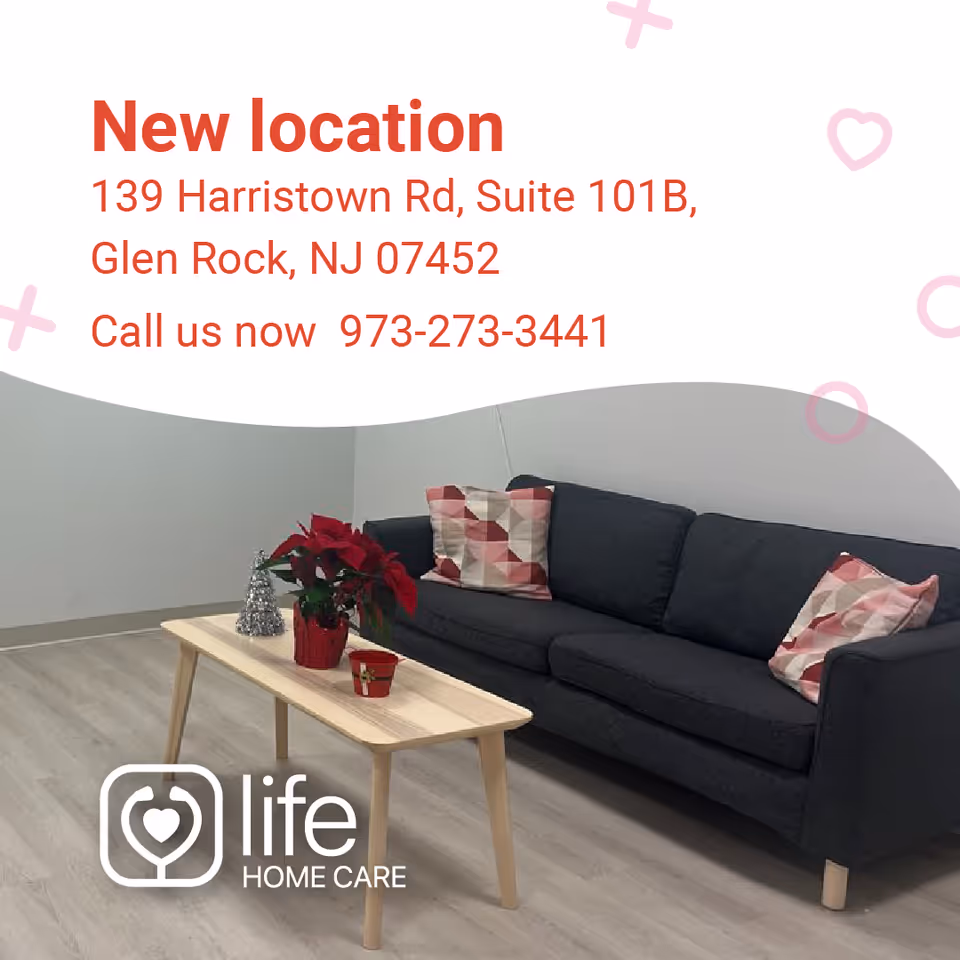 Modern living room scene with gray sofa, wooden coffee table, and Life Home Care branding.