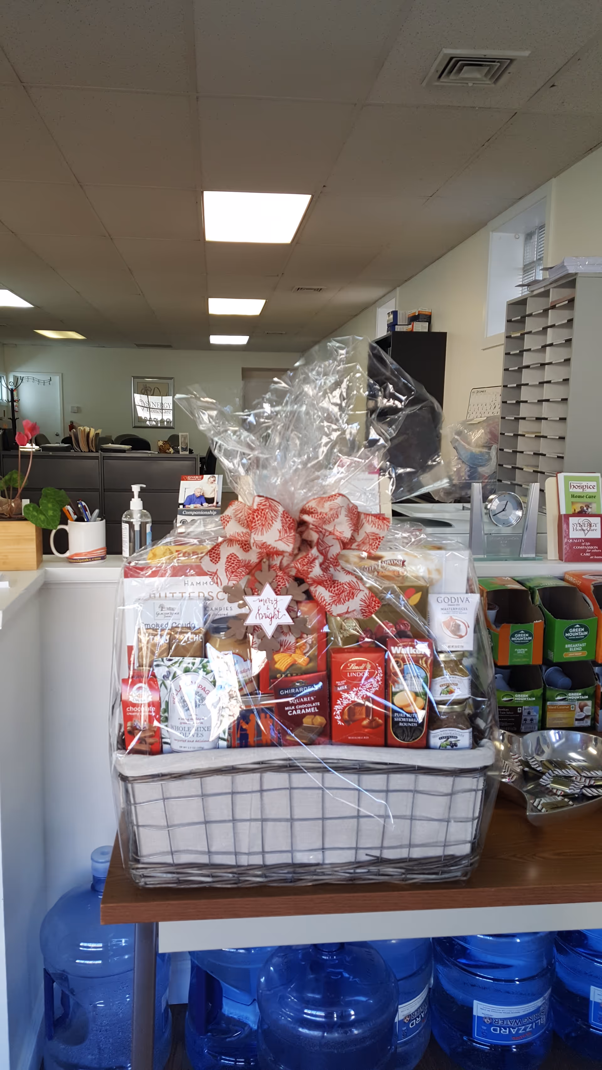 Interior facility reception area with a wrapped gift basket on the counter.
