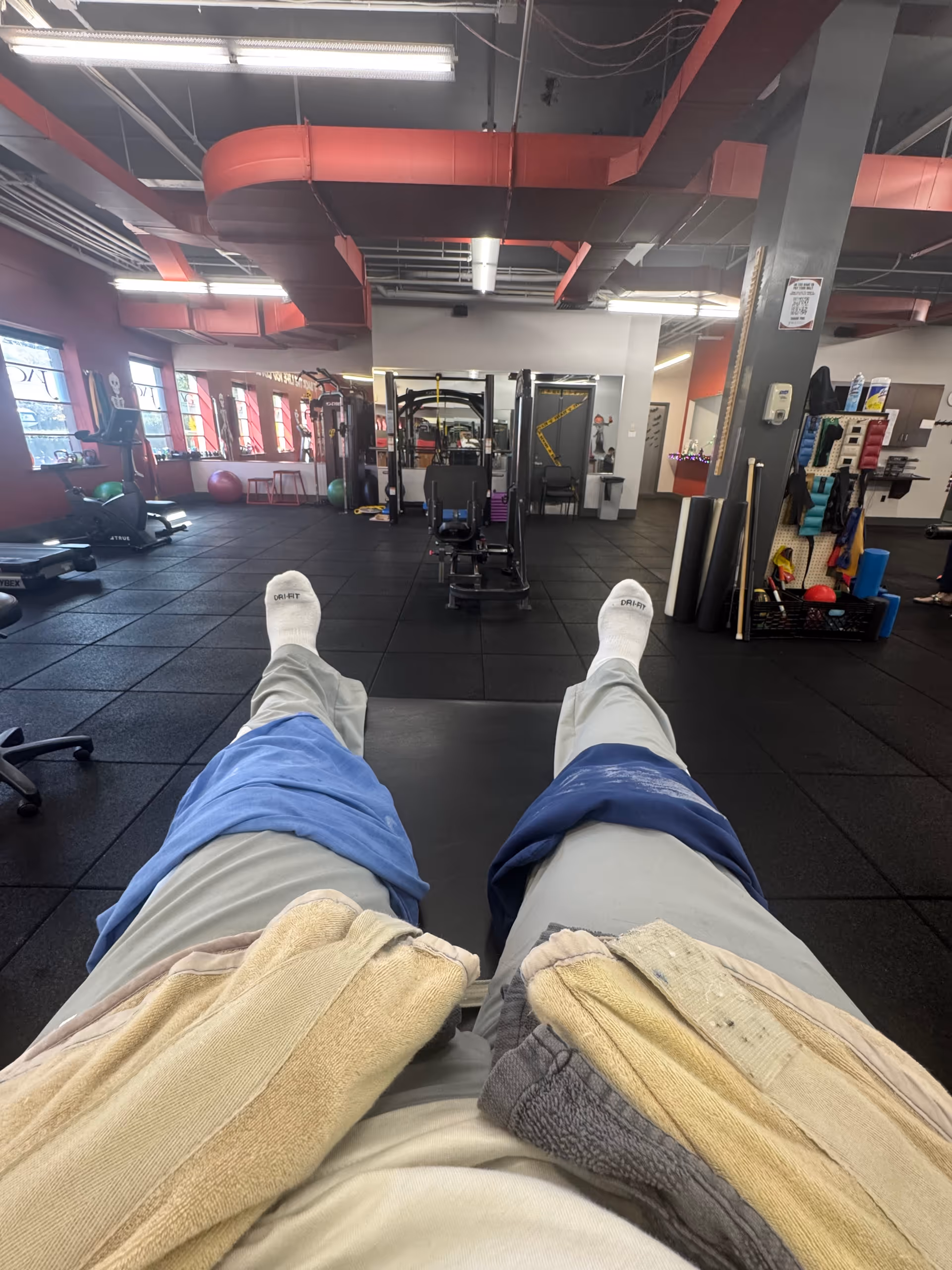 First person view from a rehabilitation gym in a senior living facility with equipment.