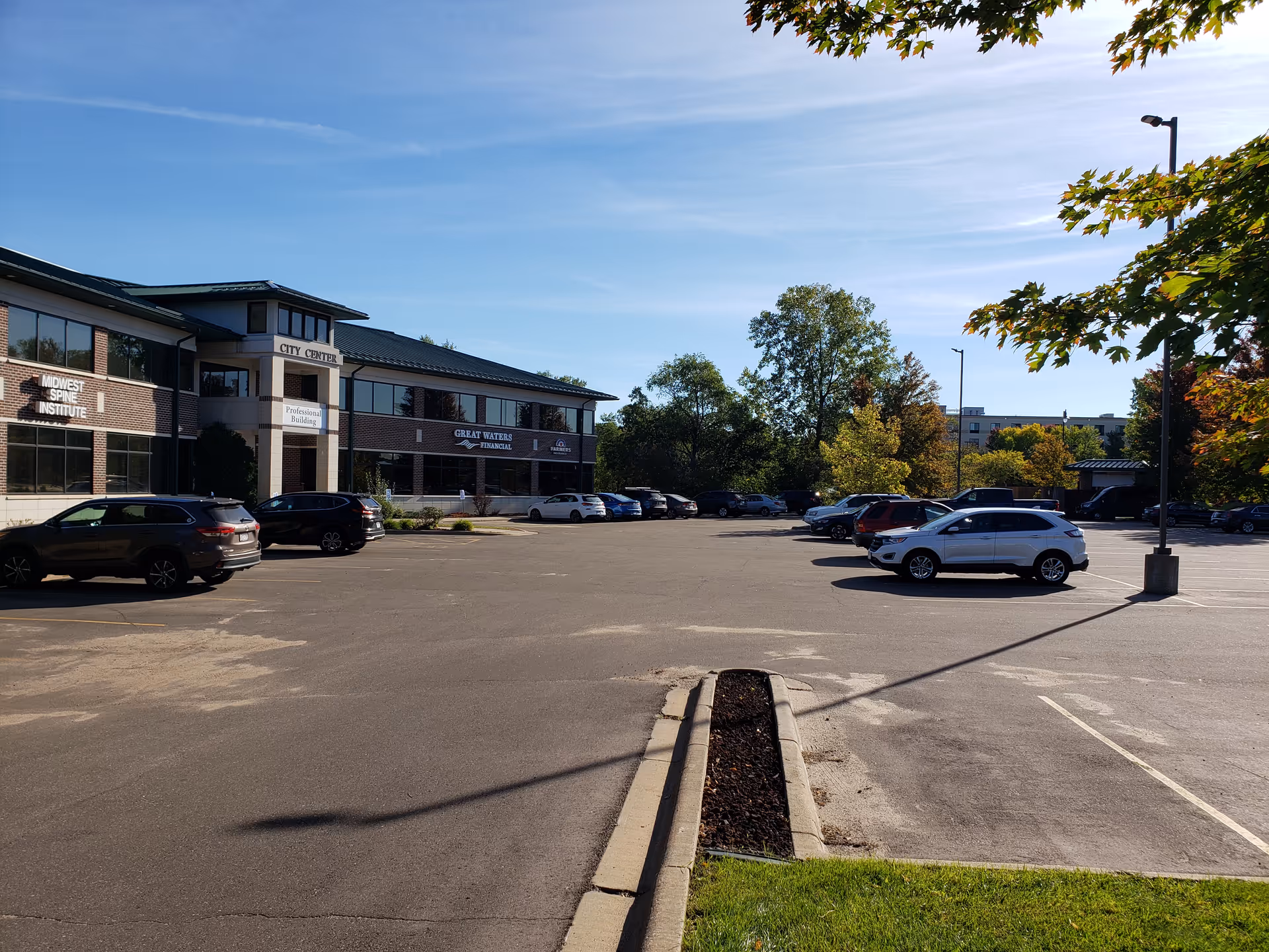 Exterior view of St. Croix Hospice building with a spacious parking lot.
