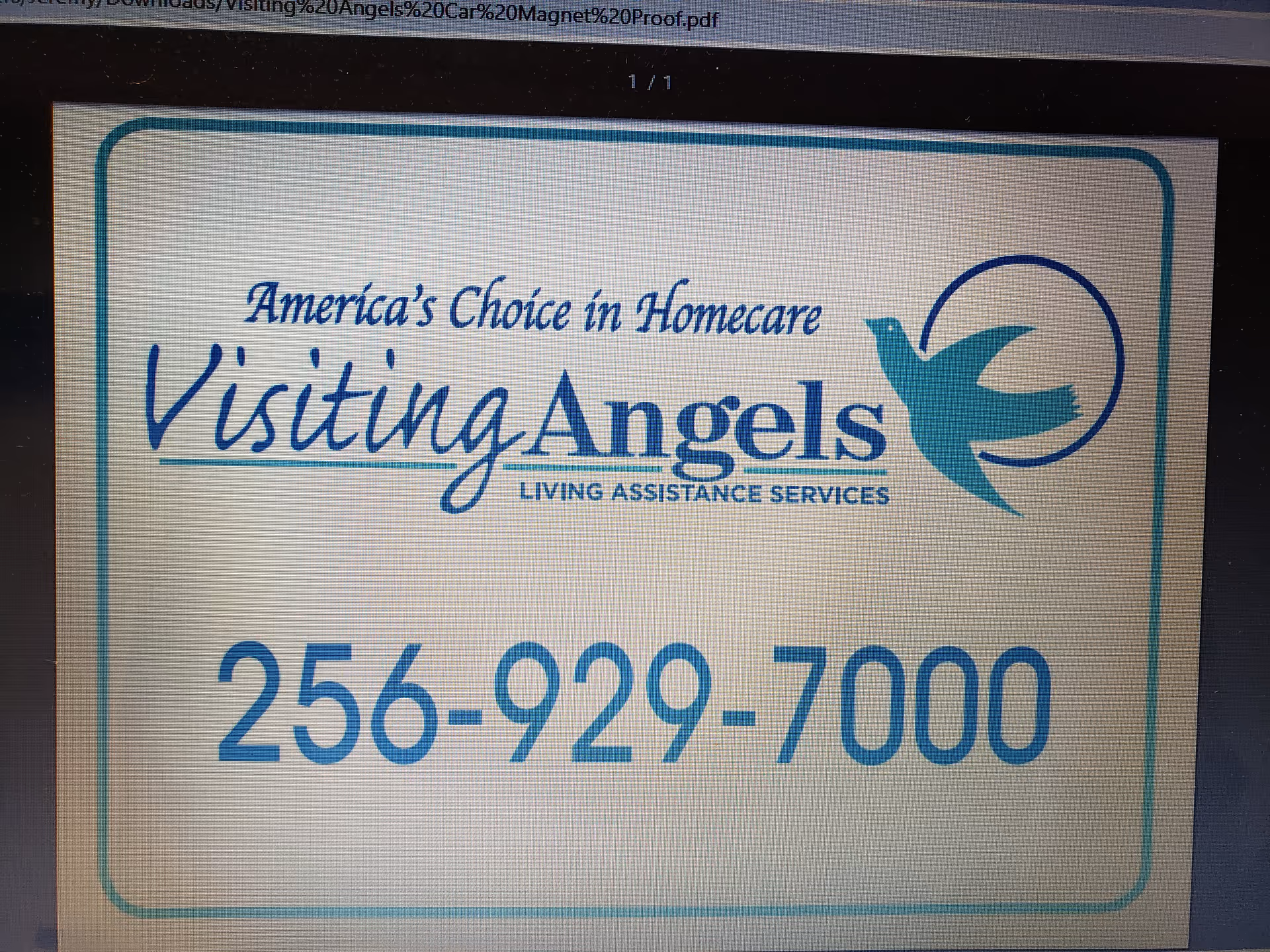 Sign displaying Visiting Angels Home Care logo and contact number.