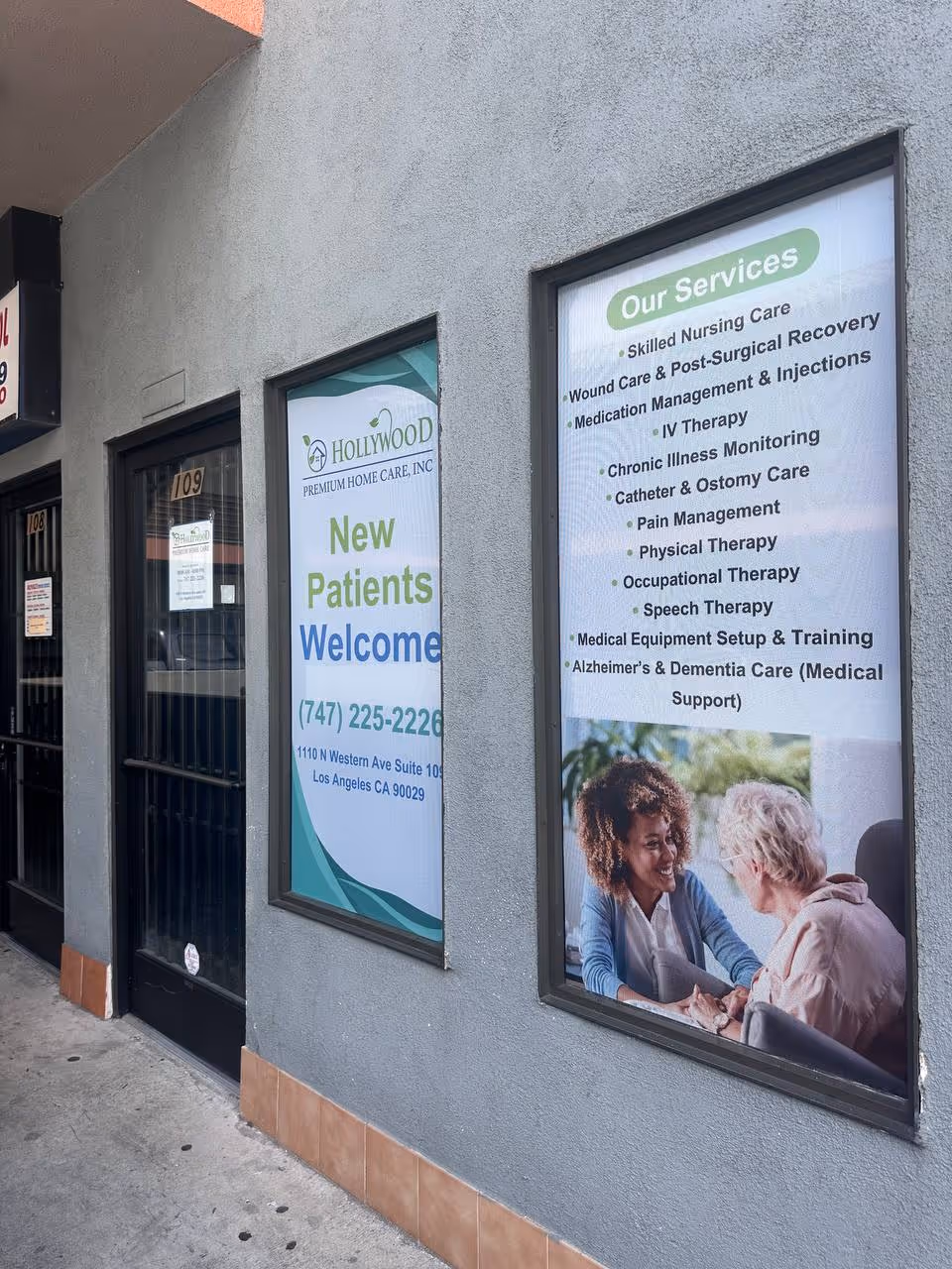 Exterior storefront with posters advertising services at Hollywood Premium Home Care