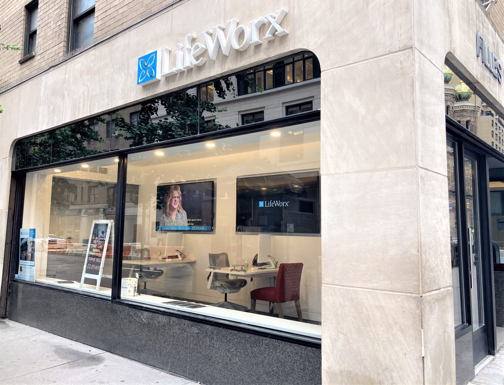 LifeWorx Home Care storefront with large glass windows revealing an interior office.