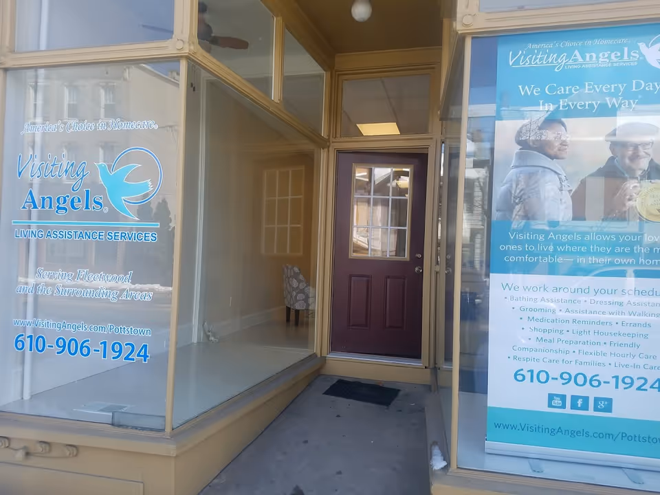Storefront of Visiting Angels Senior Home Care with glass windows and door
