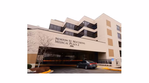 Exterior view of Norton St. Matthews Medical Plaza 2 with a parked car.