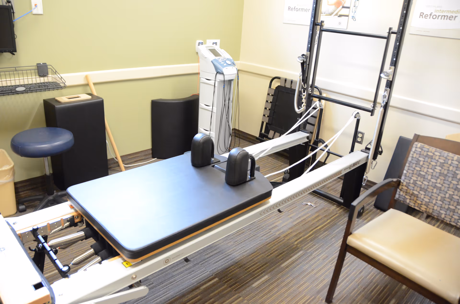 Therapy rehabilitation apparatus in a clinic room at a senior living facility.