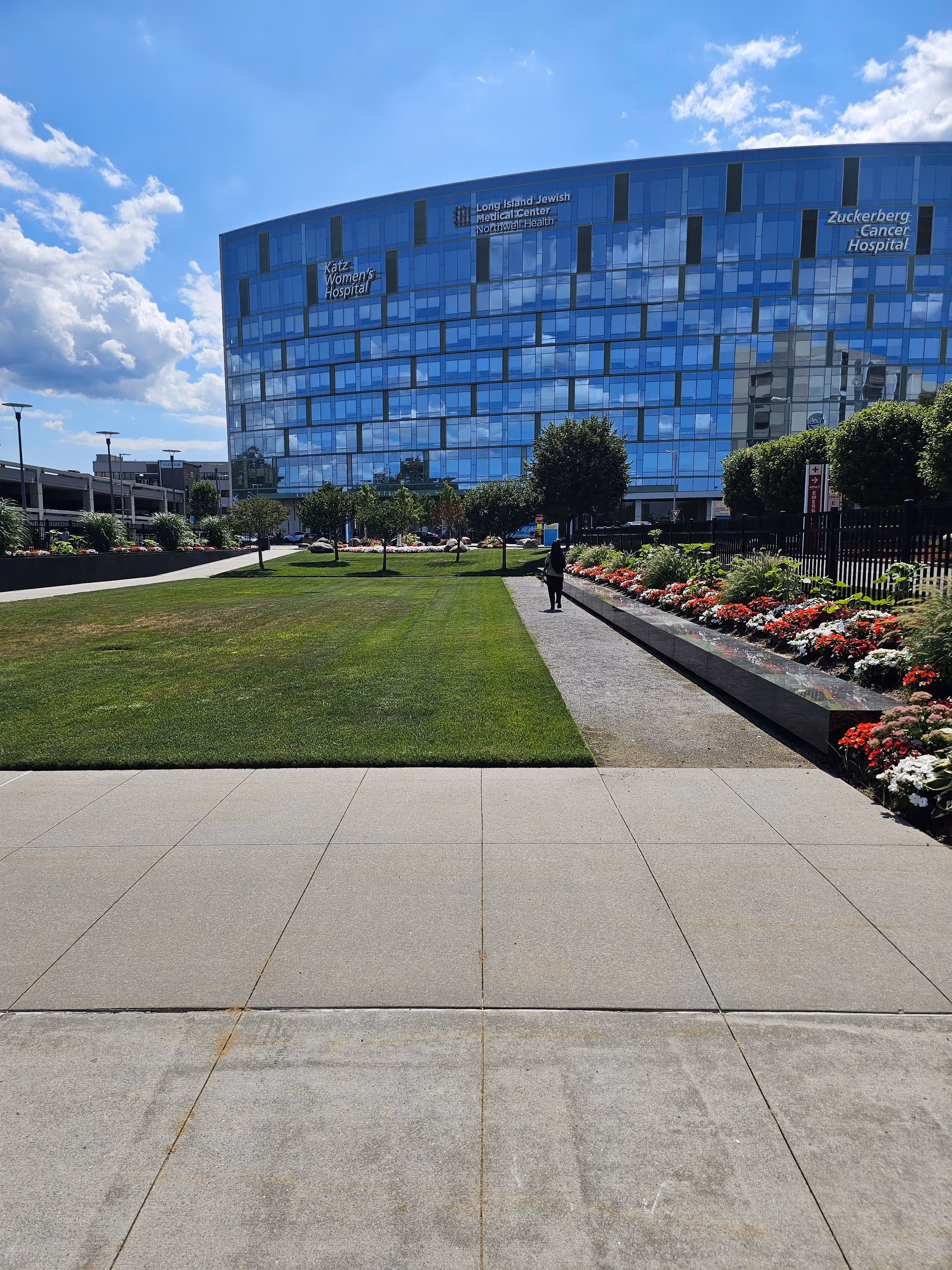 Exterior view of Parker Jewish Institute building with landscaped walkway