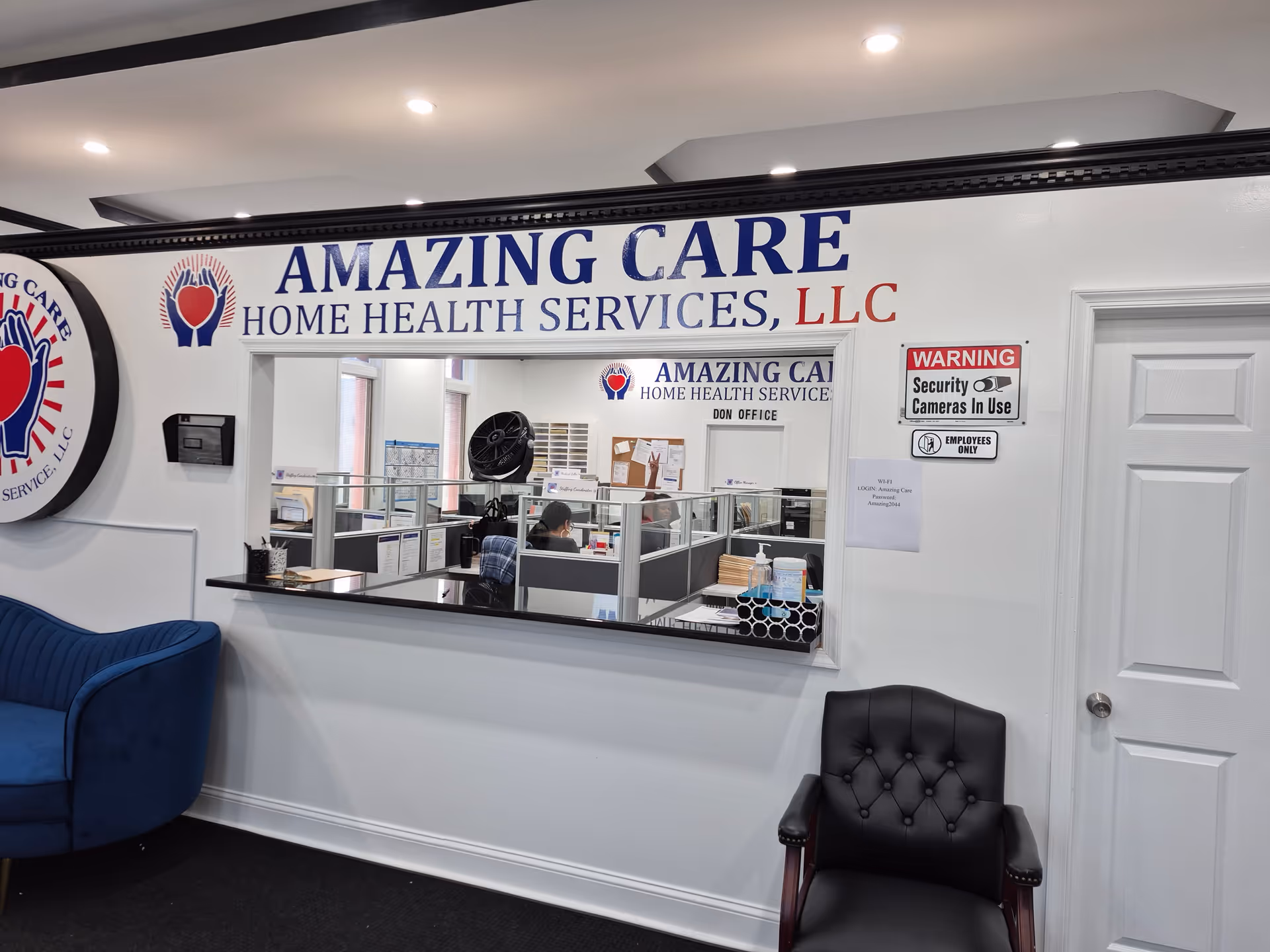 Reception area of Amazing Care Home Health Services with front desk and seating.