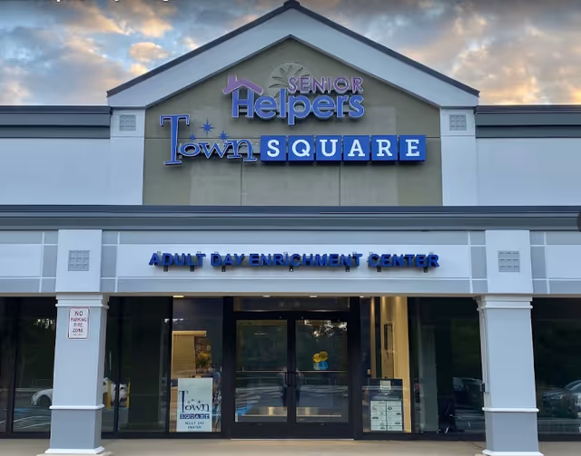 Front exterior of a Senior Helpers center with Town Square signage.