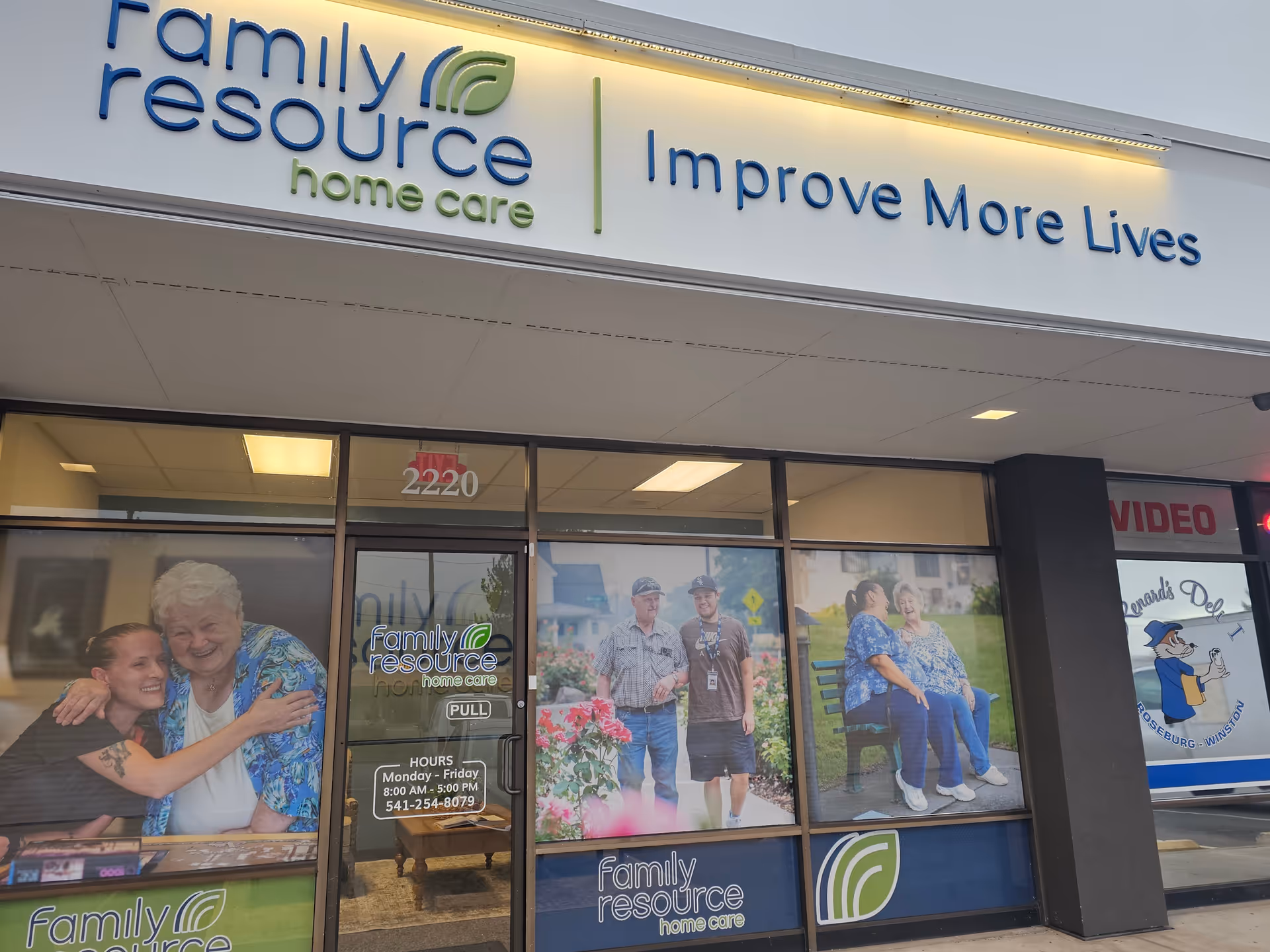 Front view of a Family Resource Home Care storefront with signage and window graphics