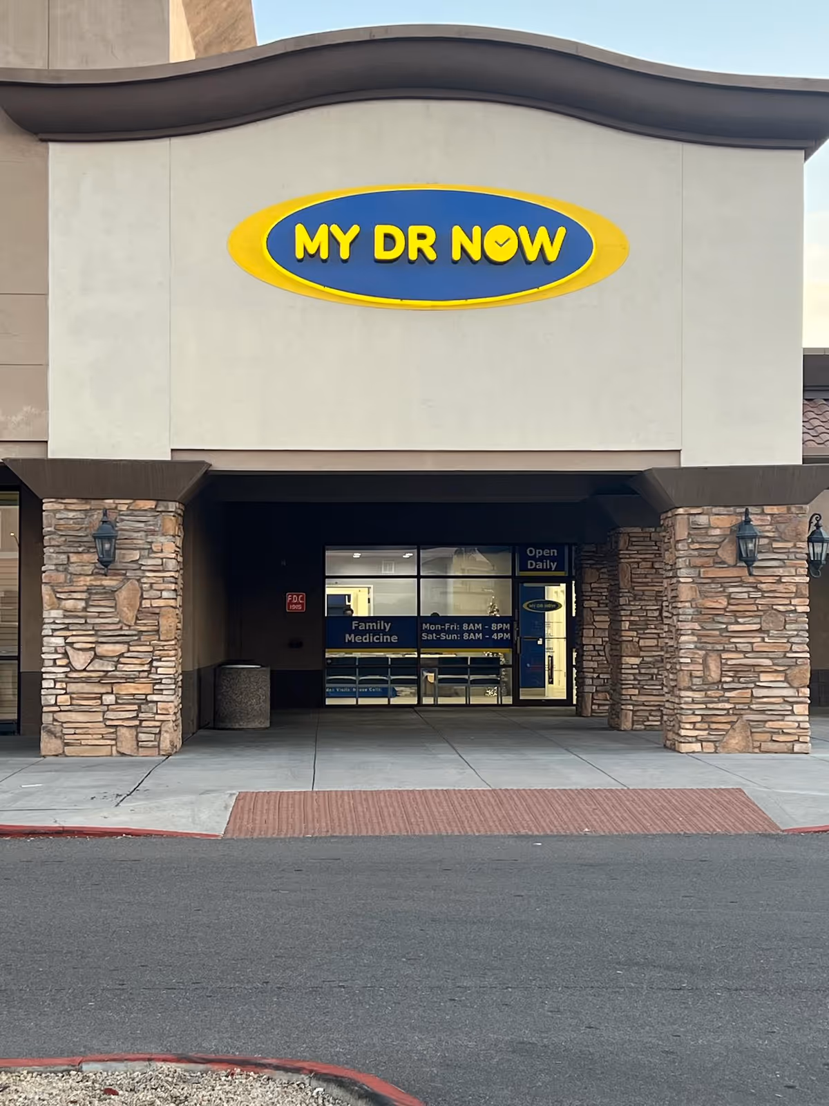 Facade of a senior living facility entrance with a MY DR NOW sign