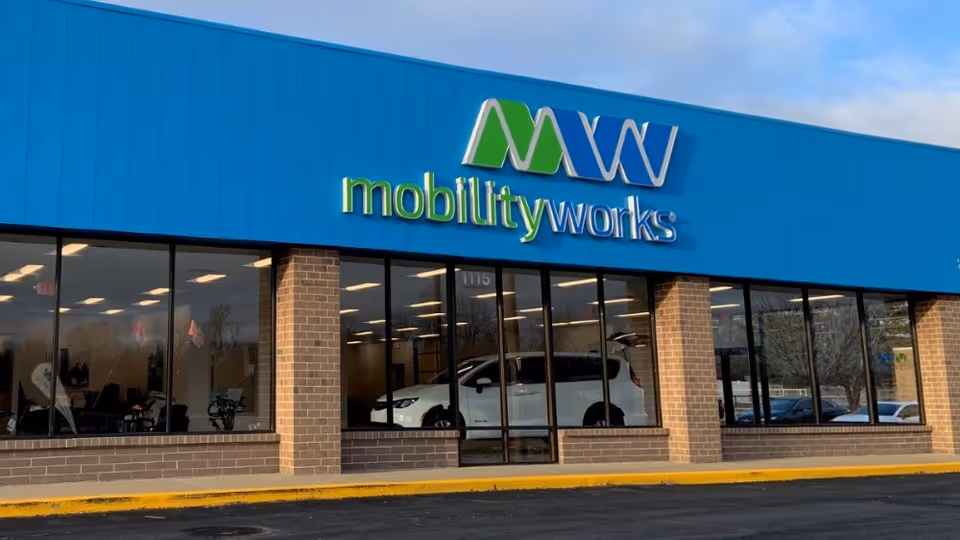 Blue MobilityWorks storefront exterior with large glass windows and signage.