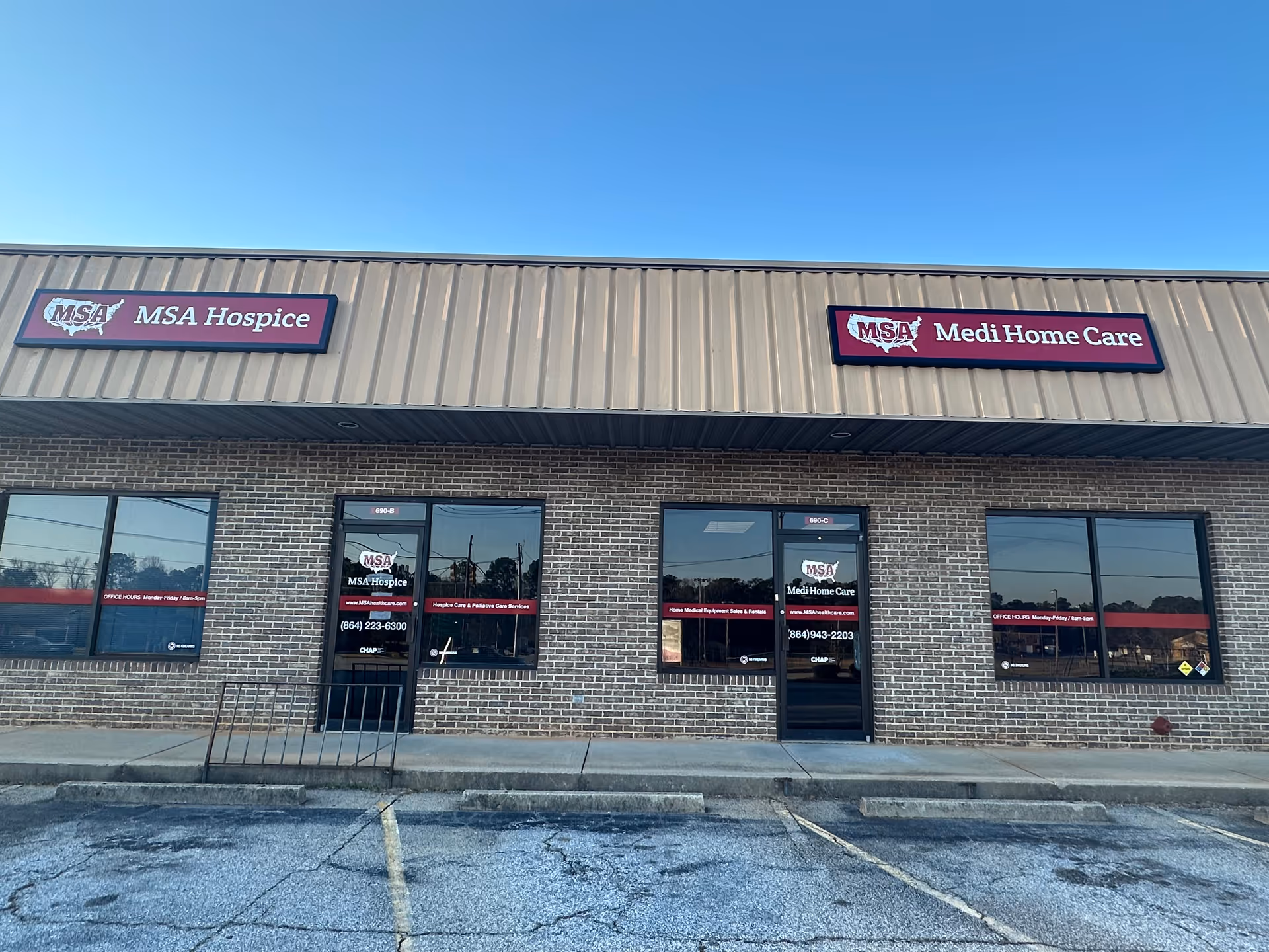 Brick storefront with MSA Hospice and Medi Home Care signs on the building facade.