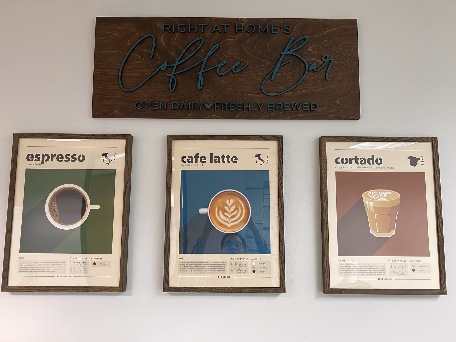 Interior wall features a Right at Home Coffee Bar sign with three coffee-themed framed posters.