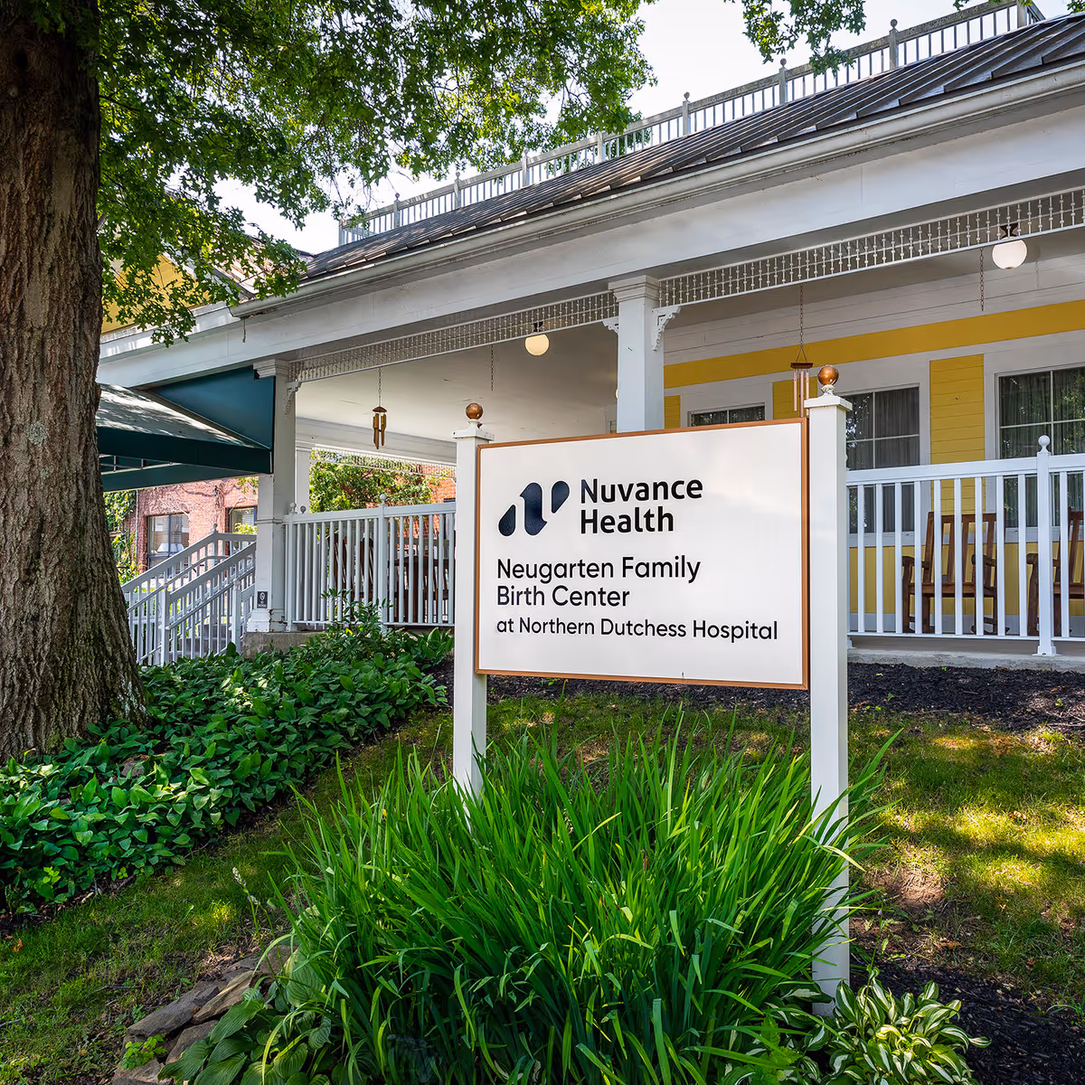 Exterior view of a building with a Nuvance Health Birth Center sign in Rhinebeck.
