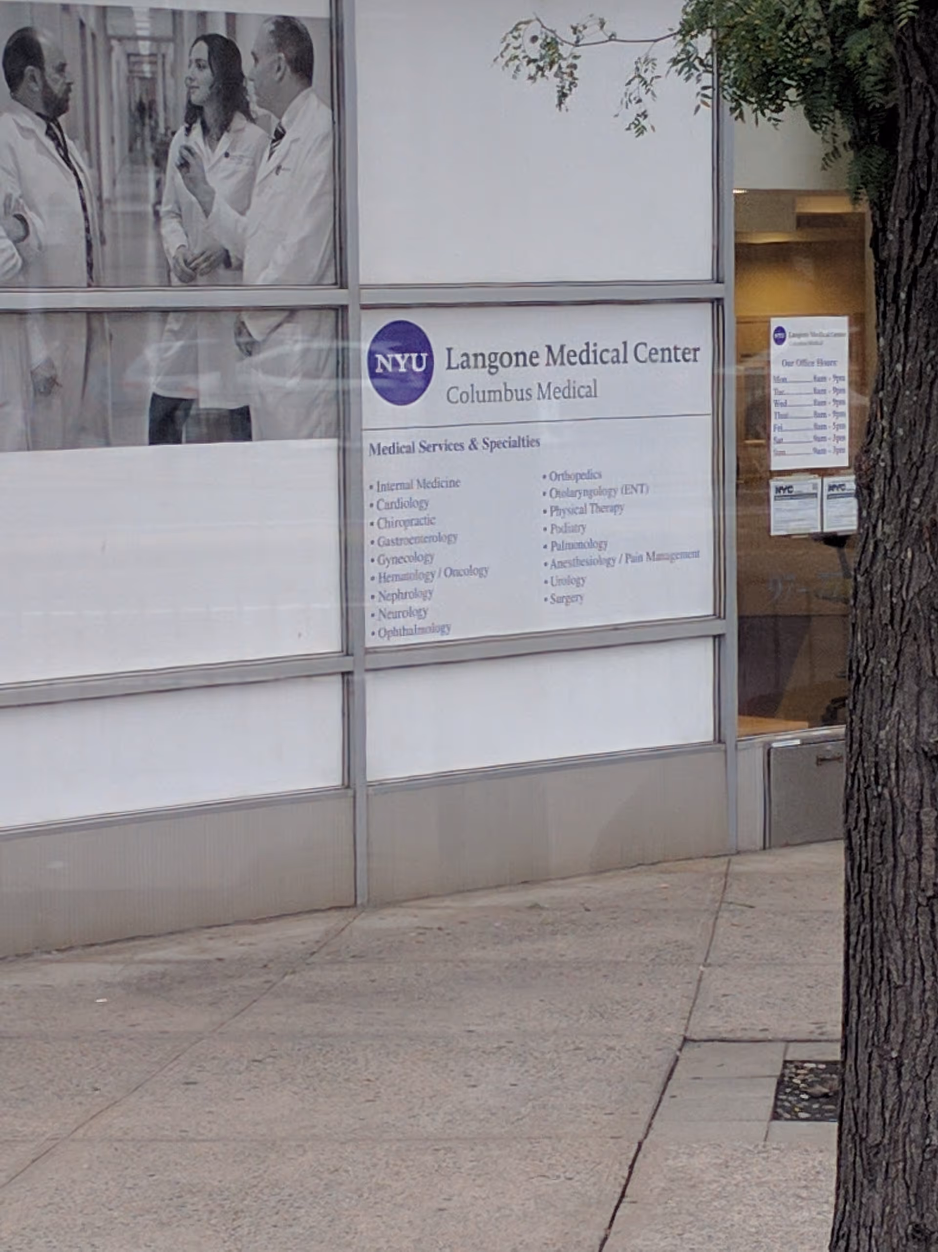 Exterior view of NYU Langone Ambulatory Care Rego Park with signage along the wall