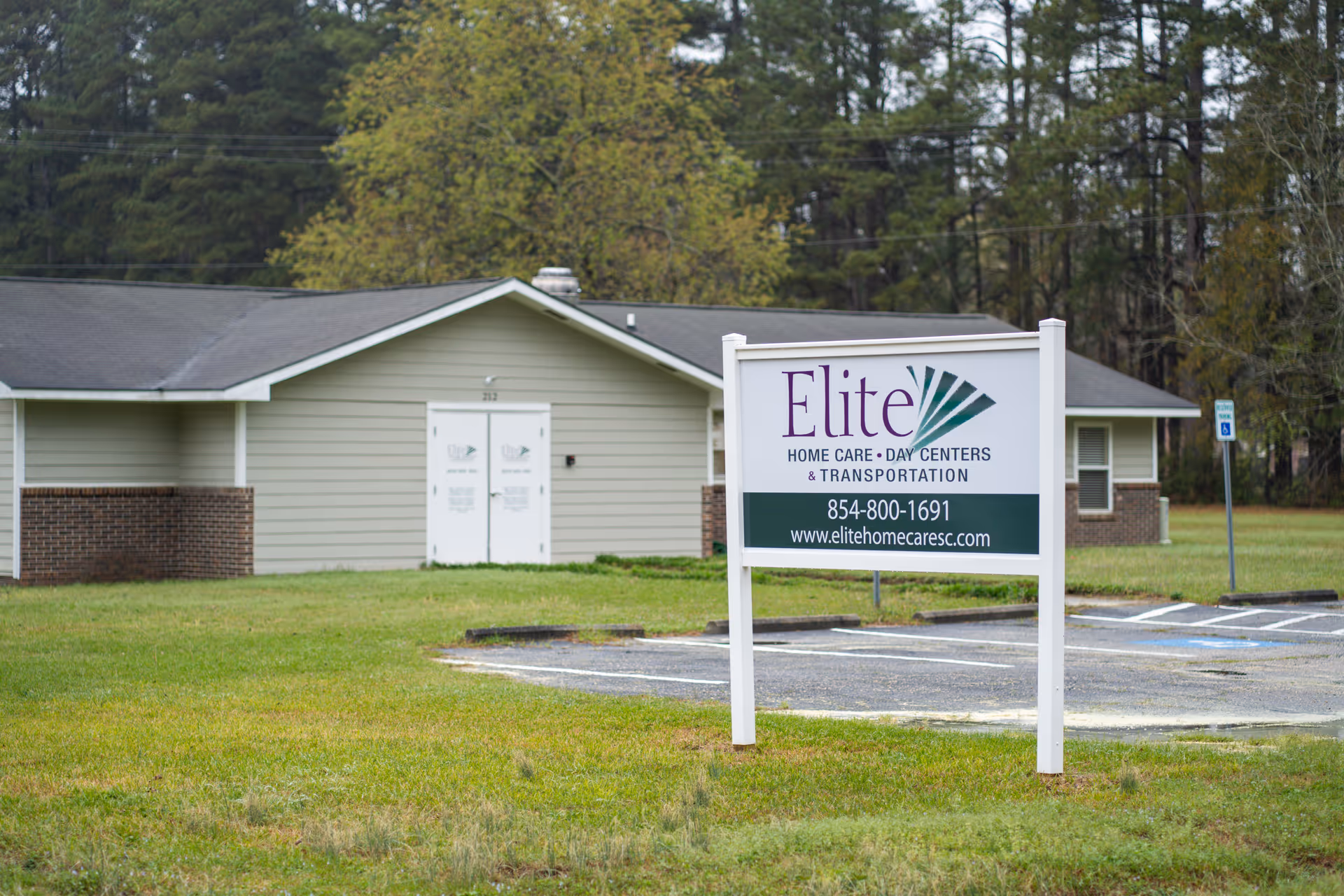 Single-story building exterior with a sign reading Elite Home Care and Day Centers.