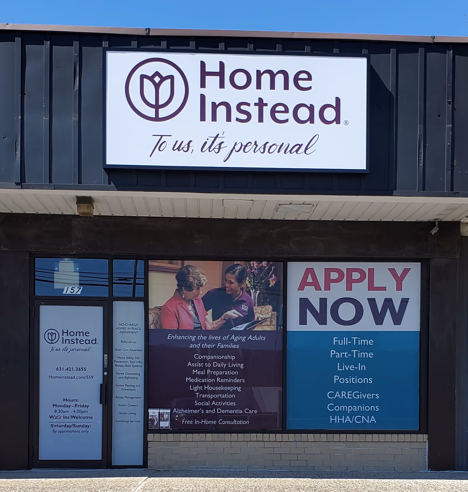 Facility storefront with Home Instead sign and job ads in windows.