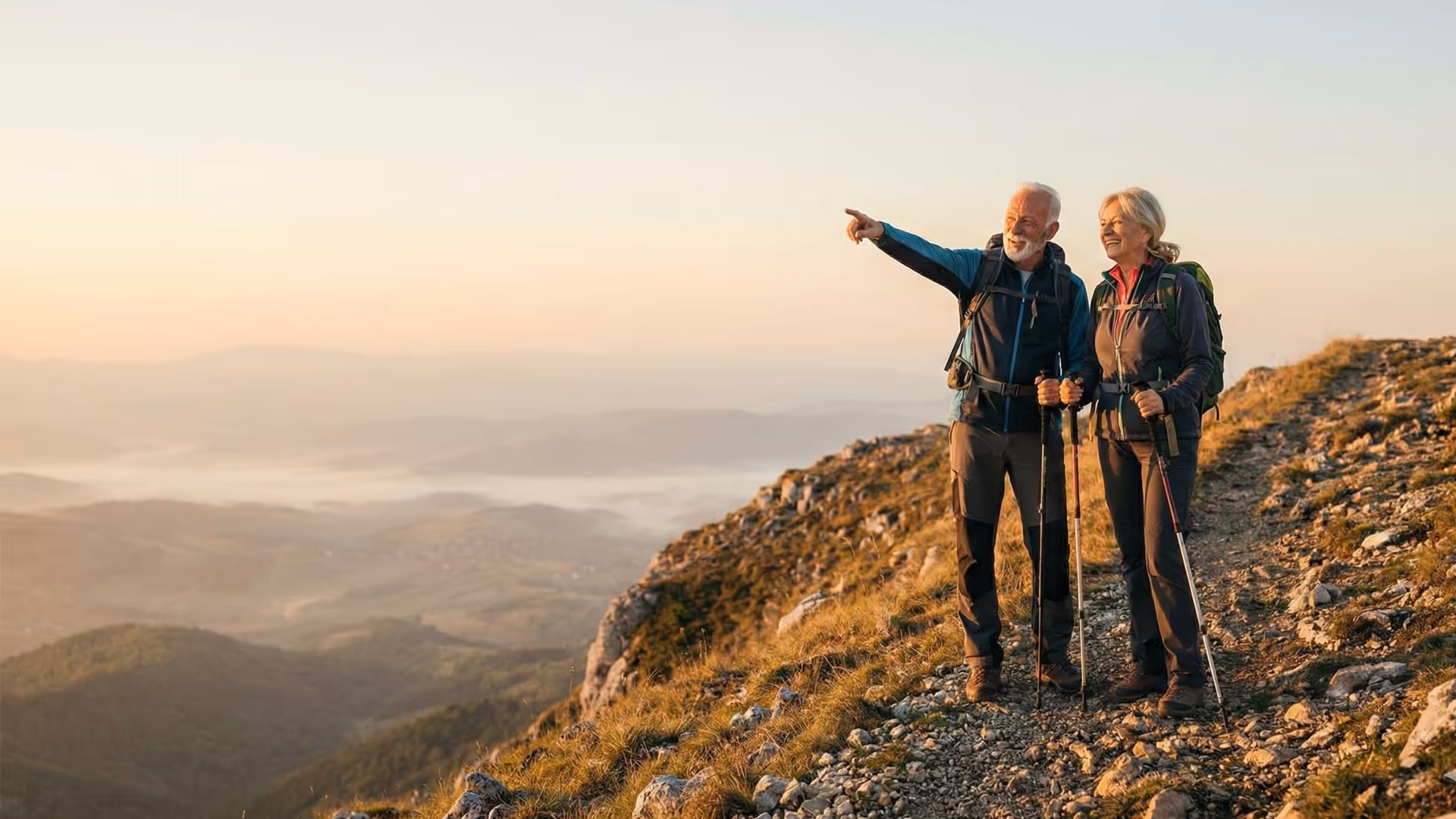 Active seniors exercising outdoors in a mountainous landscape
