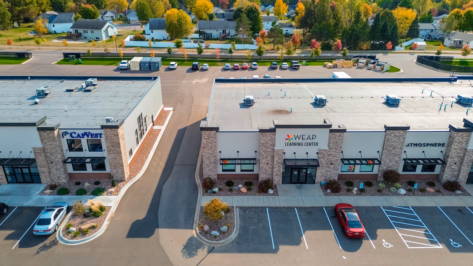 Aerial view of WEAP Learning Center building with parking lot.