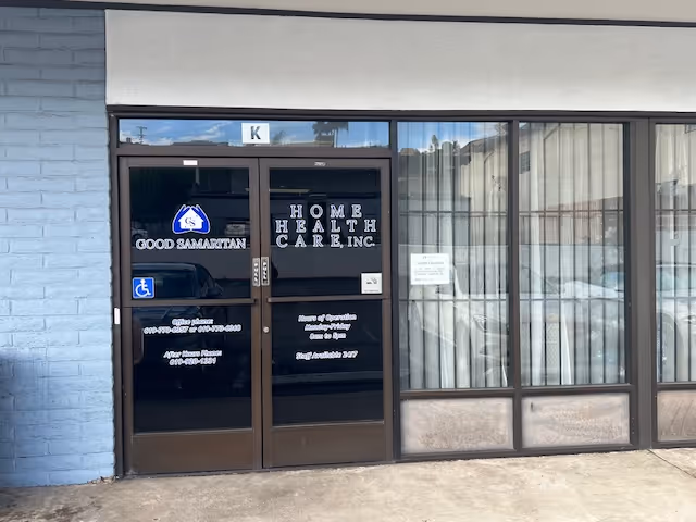 Front entrance of Good Samaritan Home Health Care Inc with glass doors and signage.
