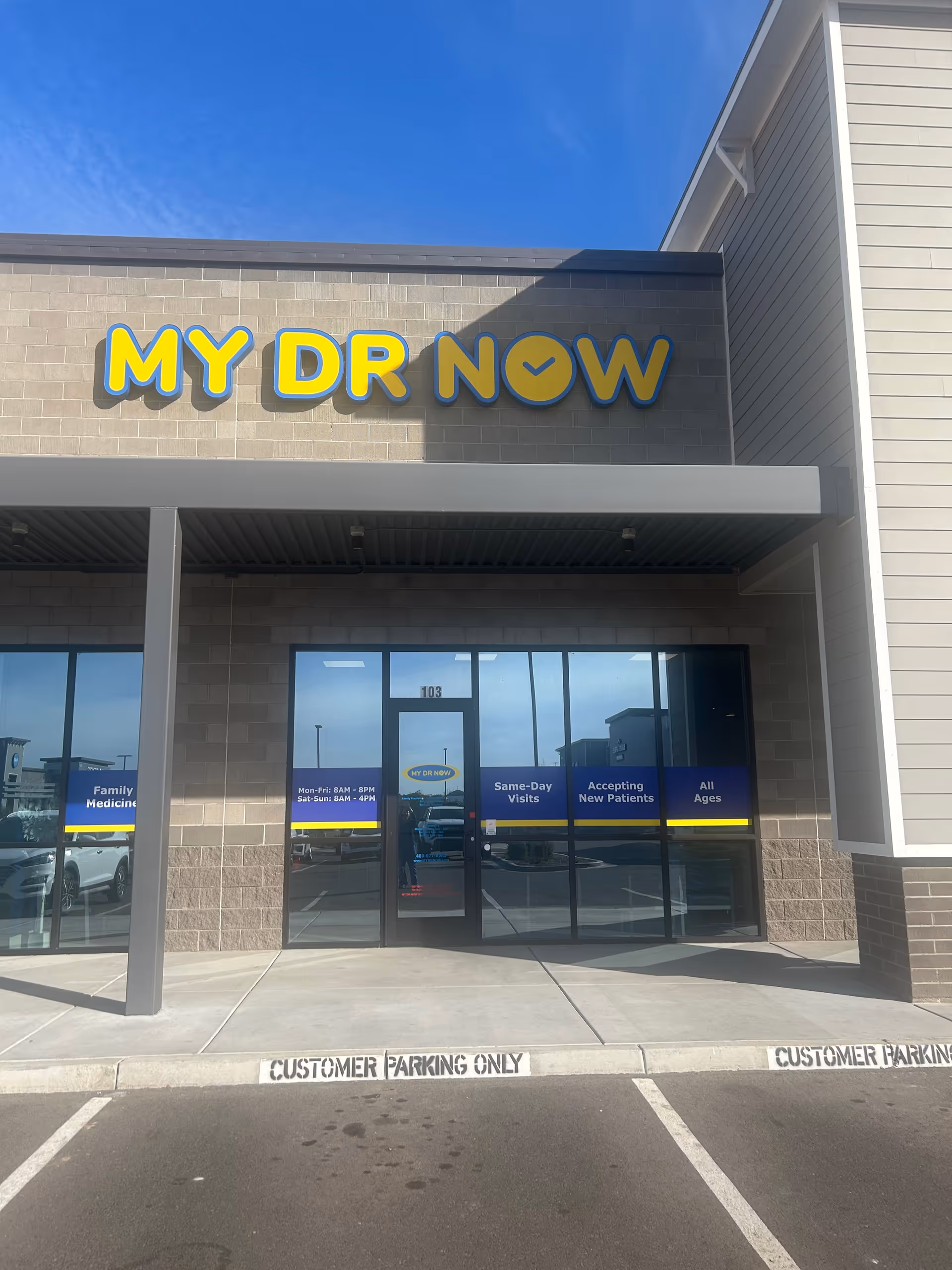 Front view of MY DR NOW clinic with glass doors and bold signage.