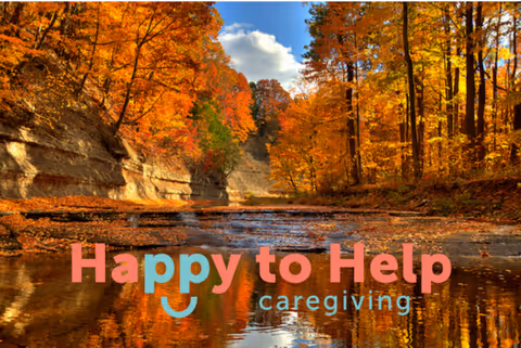Autumn forest along a river with colorful trees and a Happy to Help logo