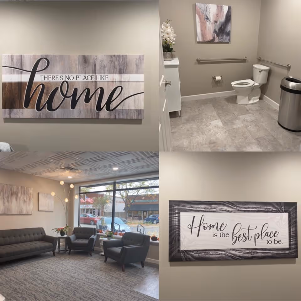 Interior of a senior living common area with seating, decor, and a bathroom.