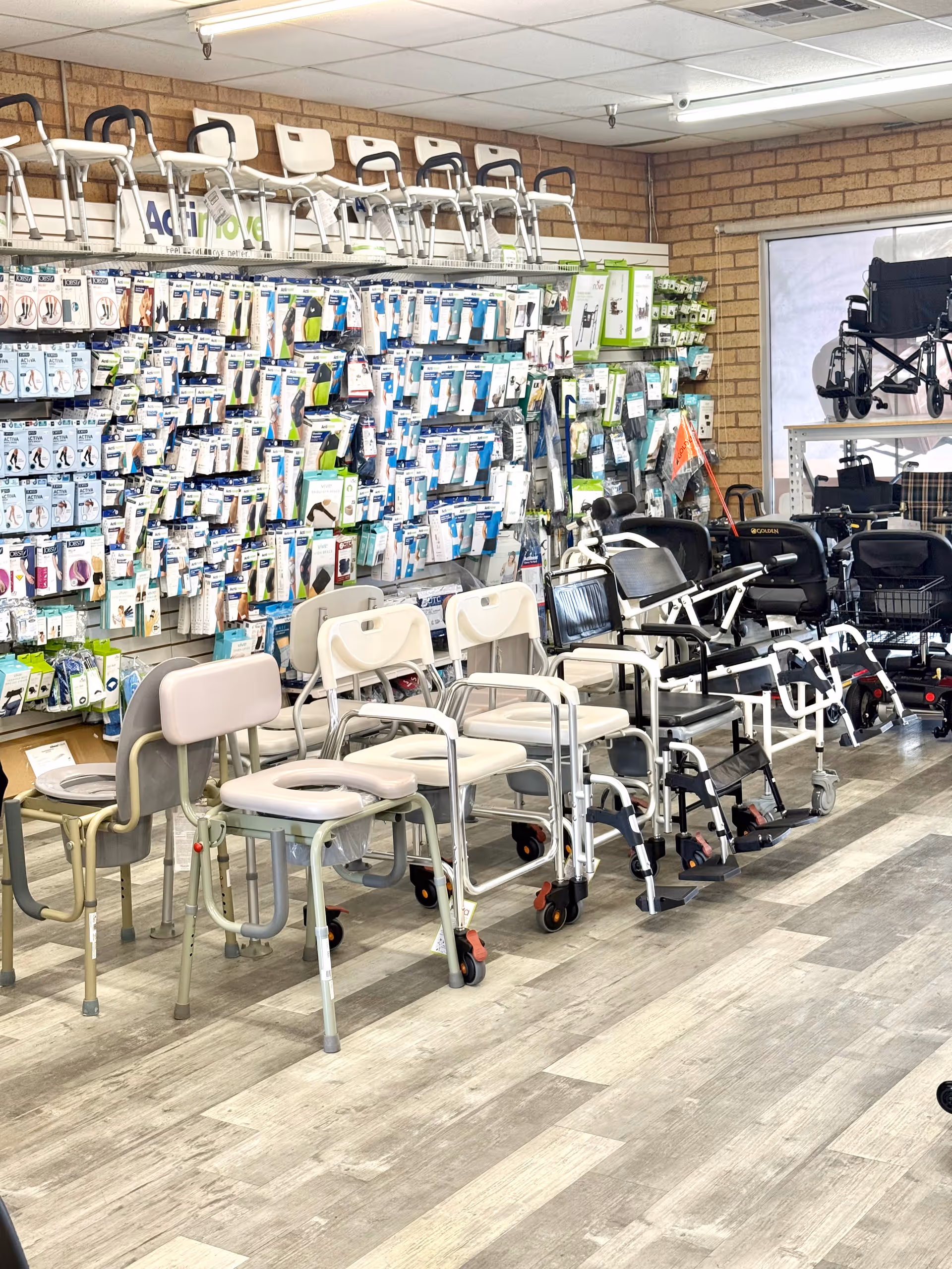 Inside Gallant Medical Supply, a showroom of mobility aids and seating displays.