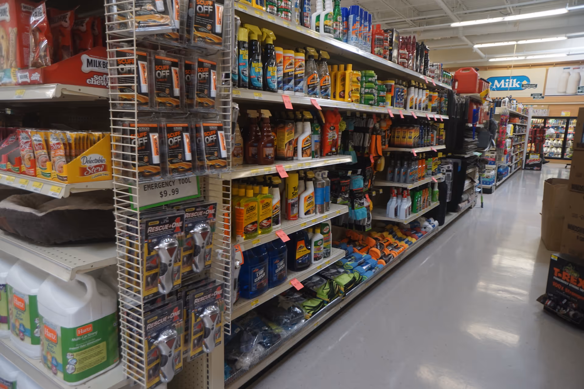 Interior Discount Drug Mart aisle stocked with cleaning and household products.