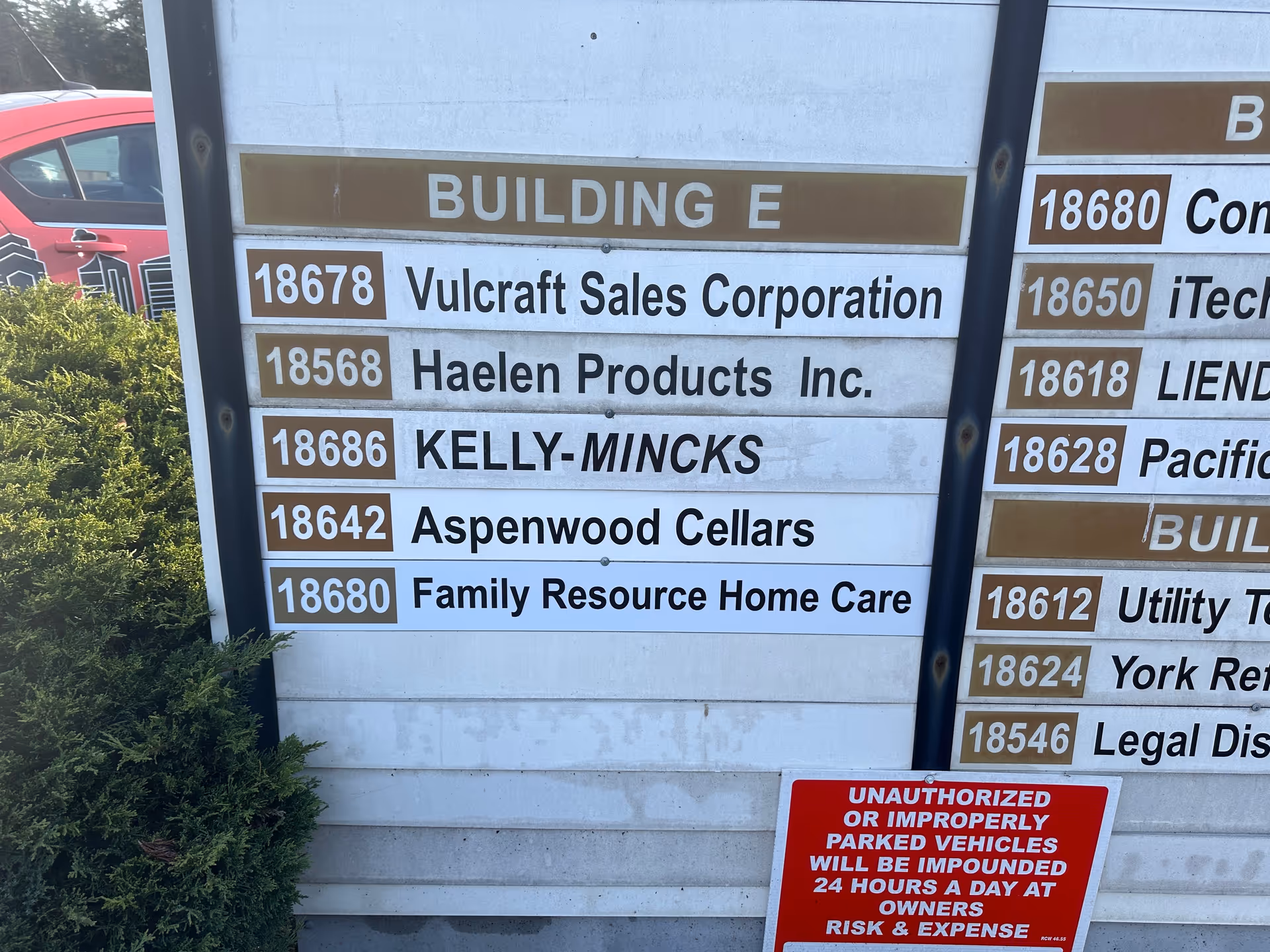 Outdoor building directory sign listing tenants, including Family Resource Home Care.