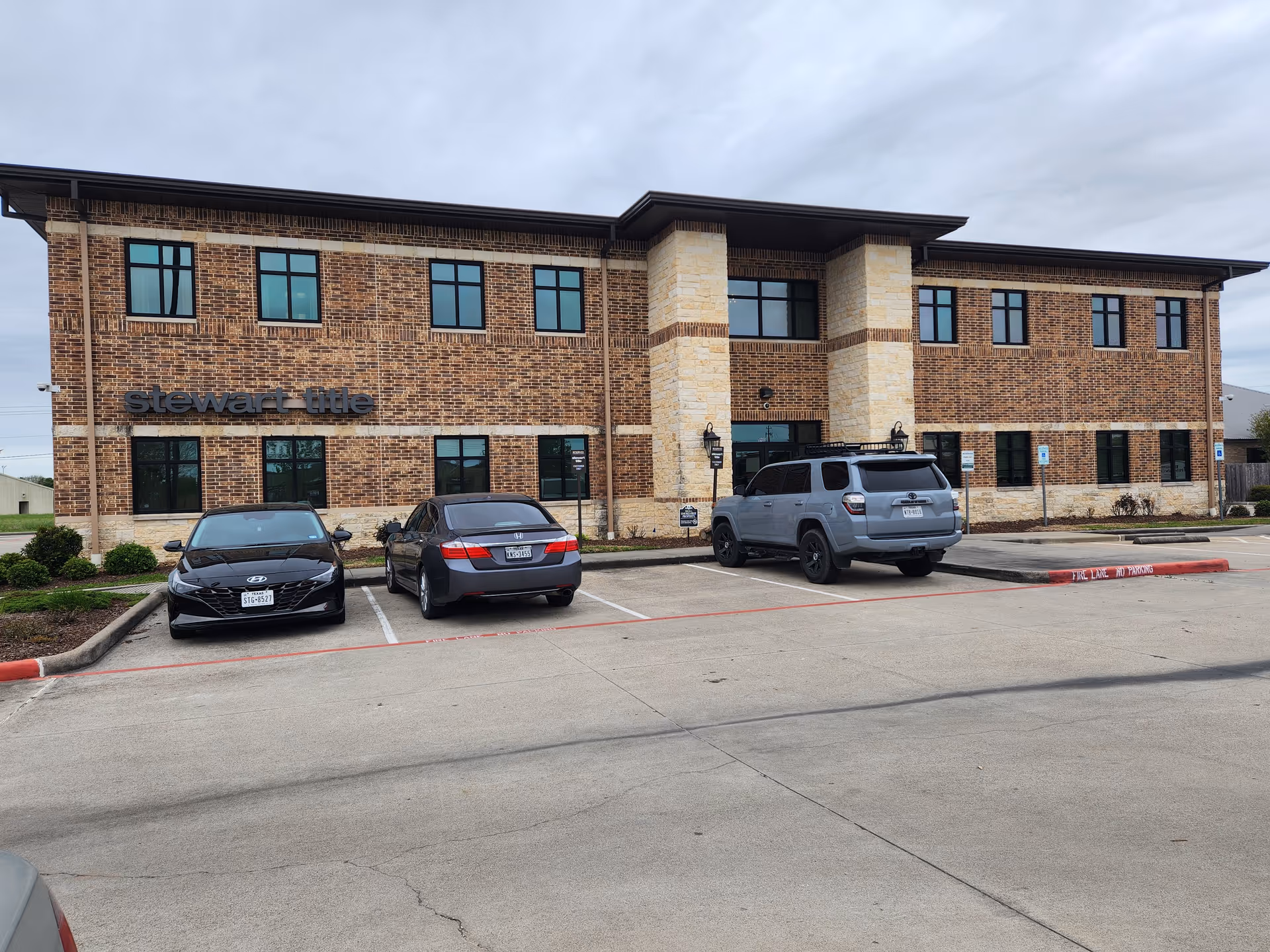 Gulf Coast Primary Home Care building exterior with parked cars in front.