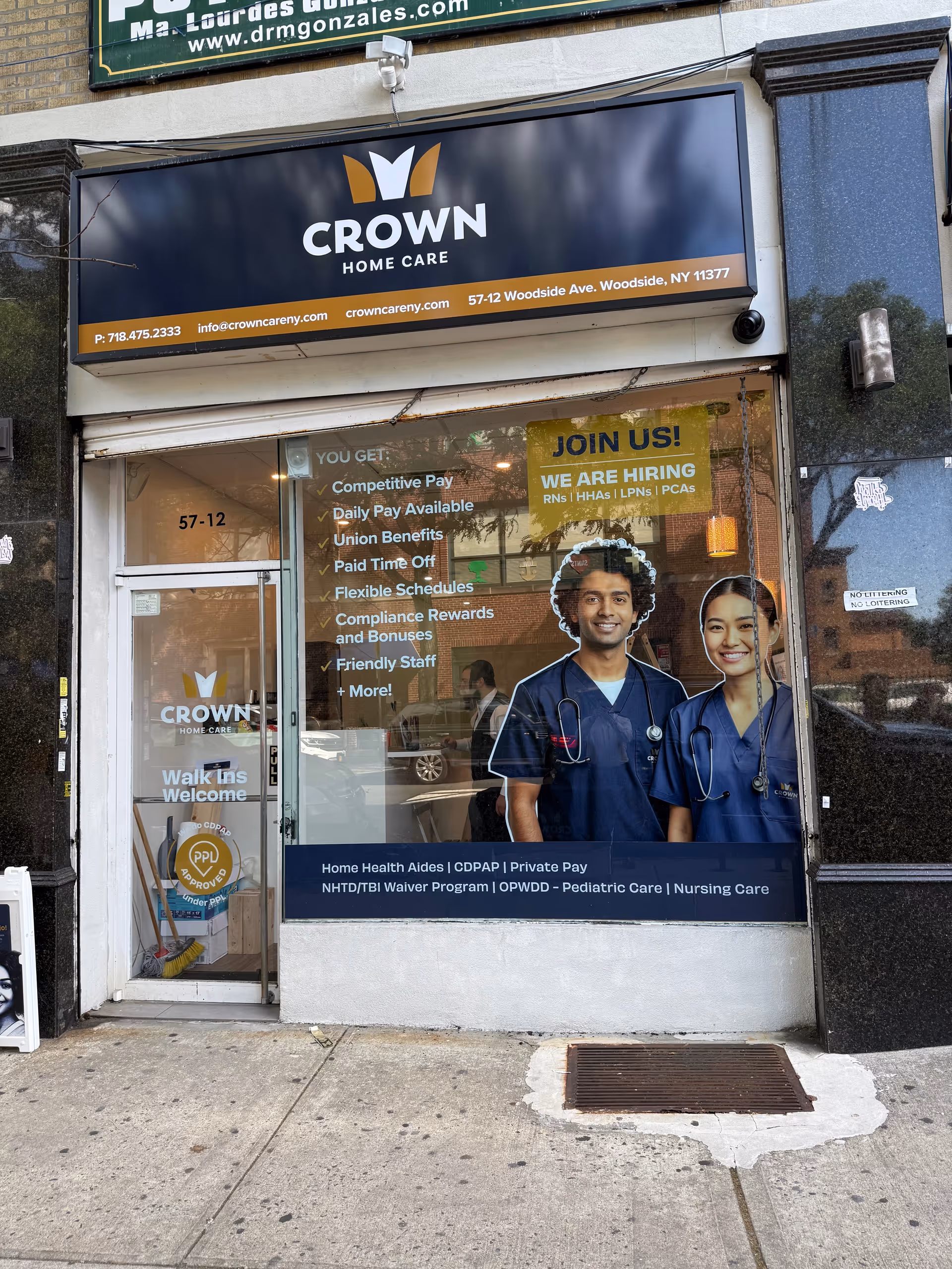 Exterior storefront displaying Crown Home Care sign and a 'Join Us' hiring poster with two nurses.