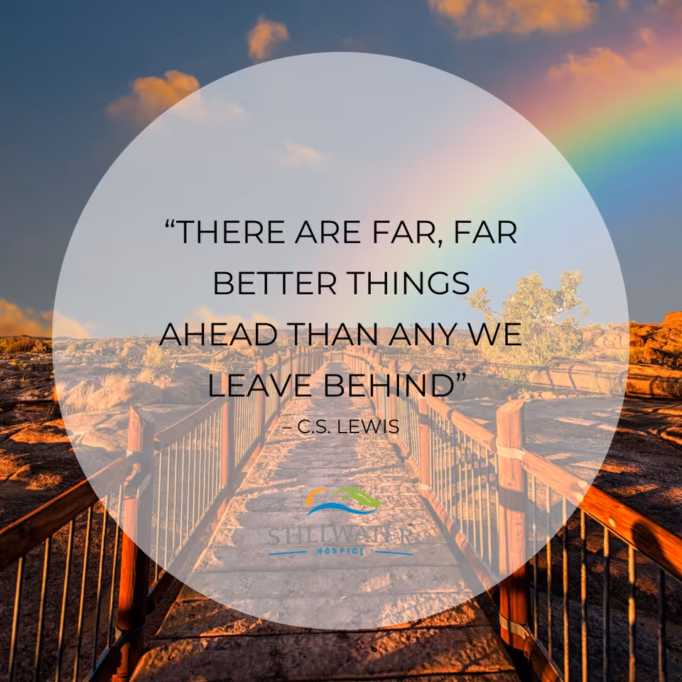 Outdoor boardwalk path with railing, rainbow, and a circular quote overlay.